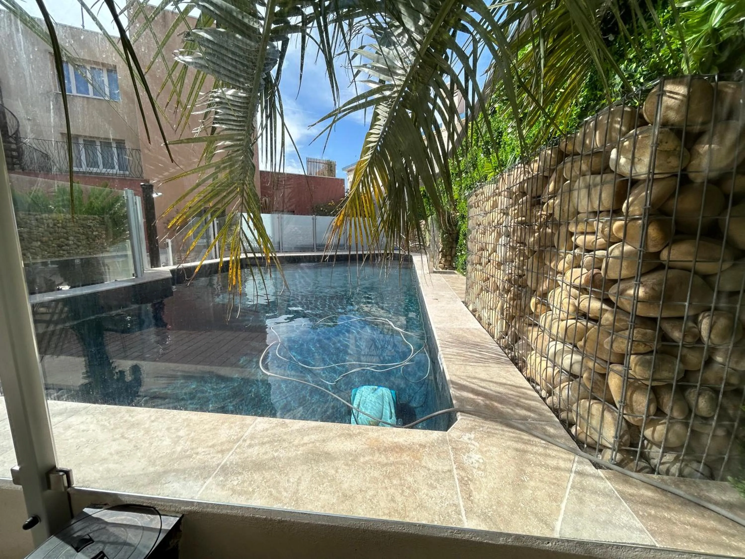 Swimming pool in Logis Hotel De La Clape