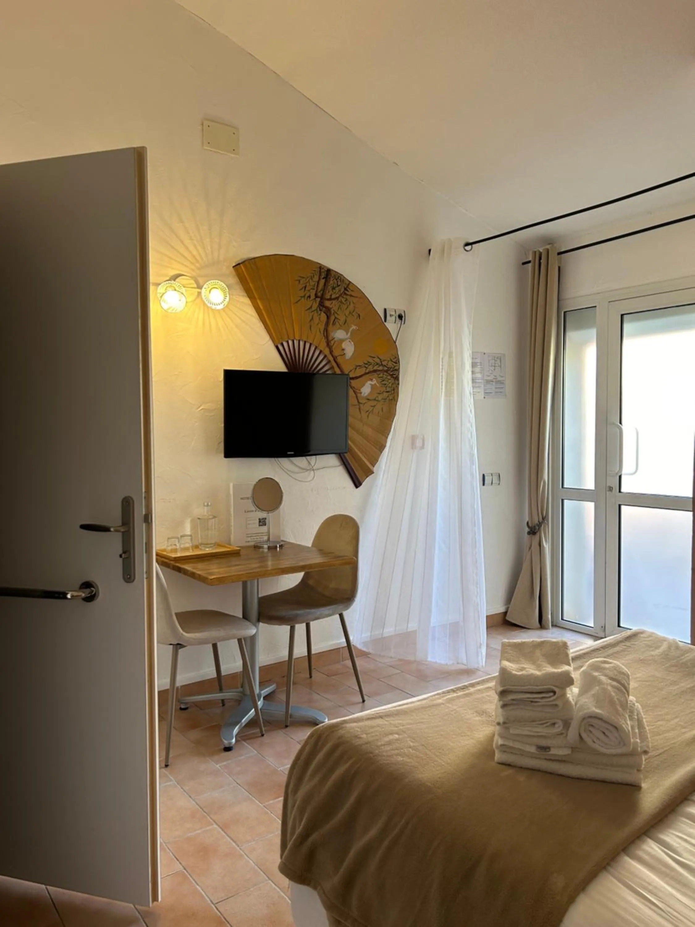 Photo of the whole room, Bed in Logis Hotel De La Clape