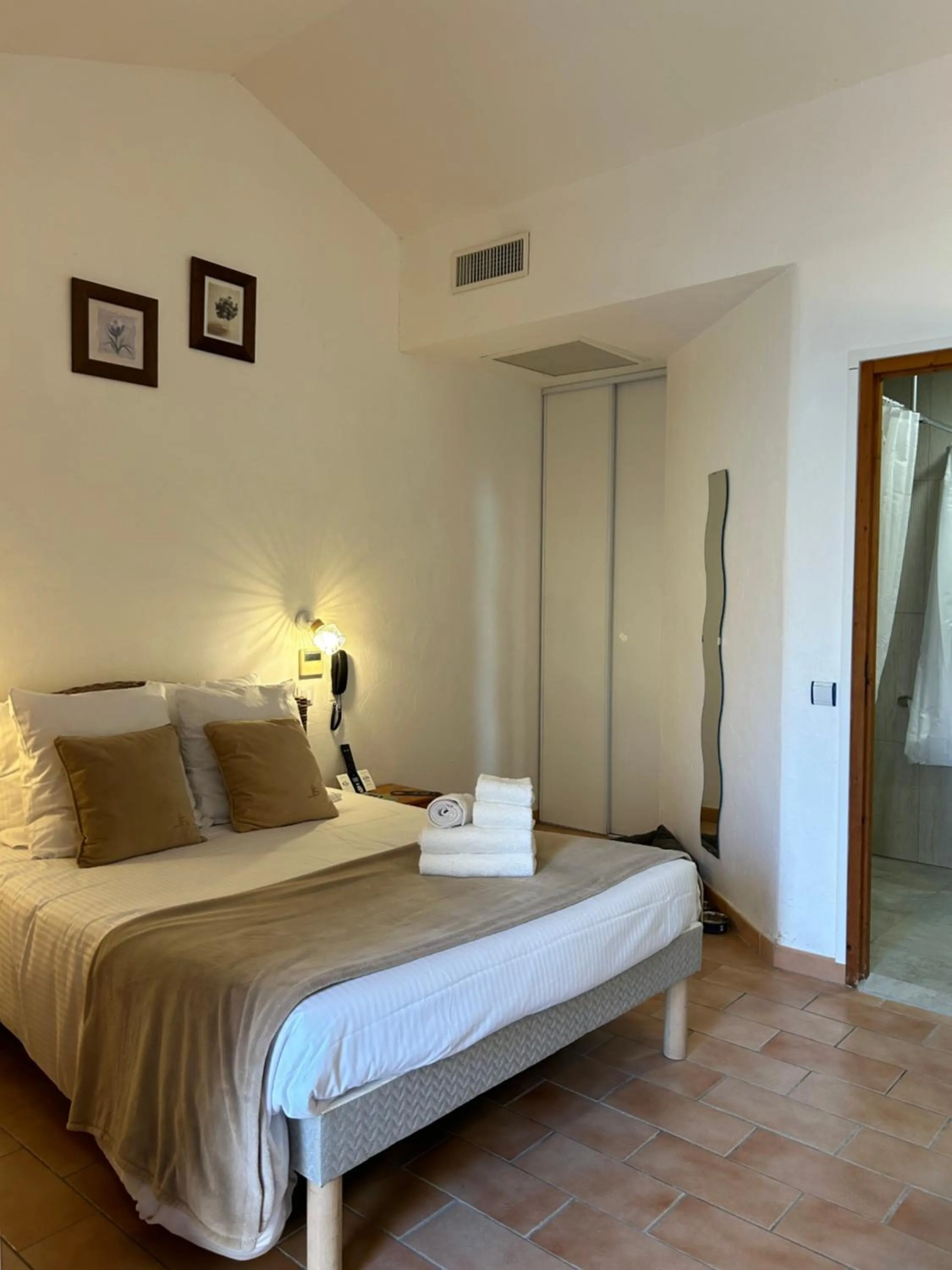 Photo of the whole room, Bed in Logis Hotel De La Clape