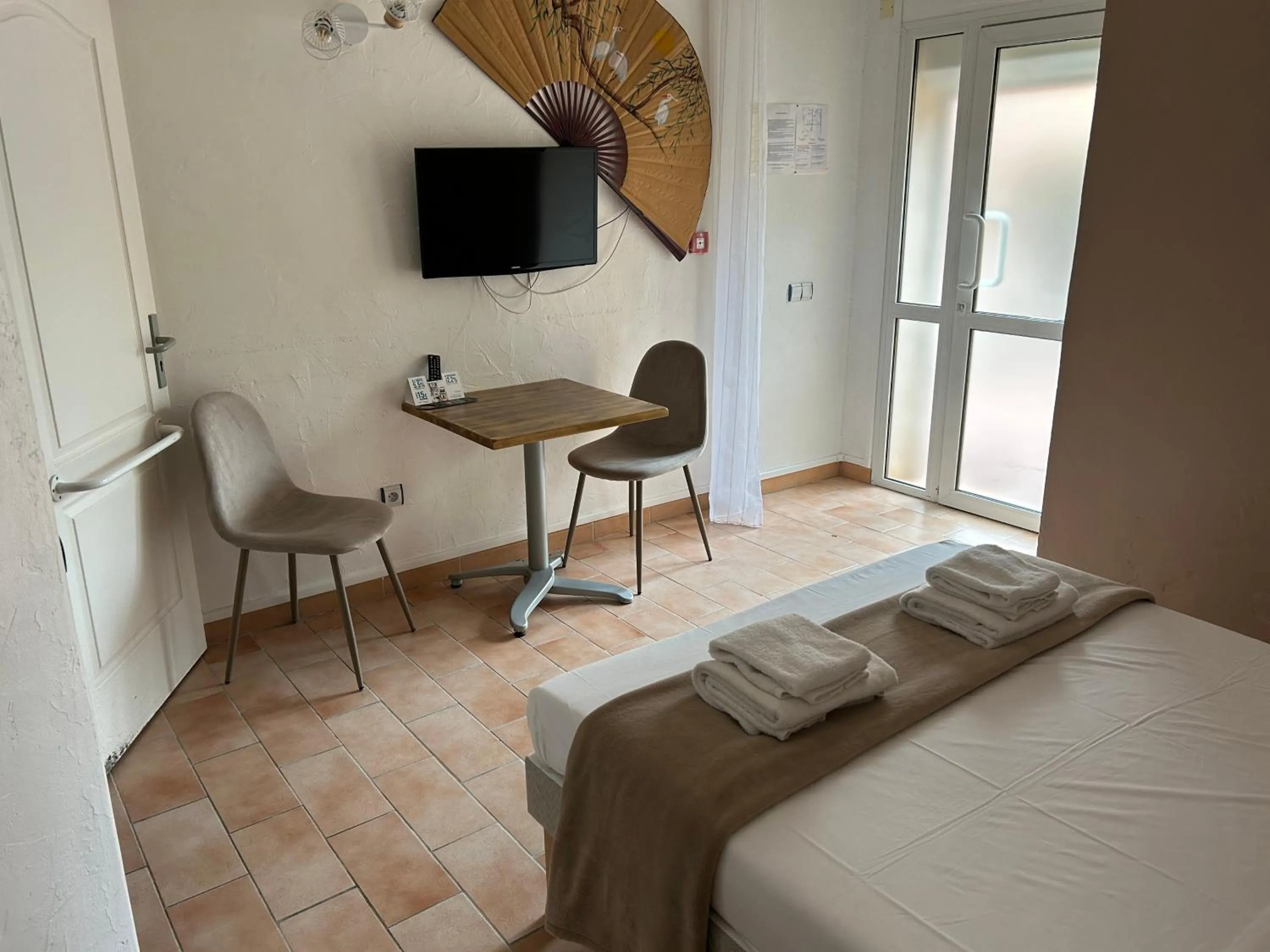 Bedroom, Bed in Logis Hotel De La Clape