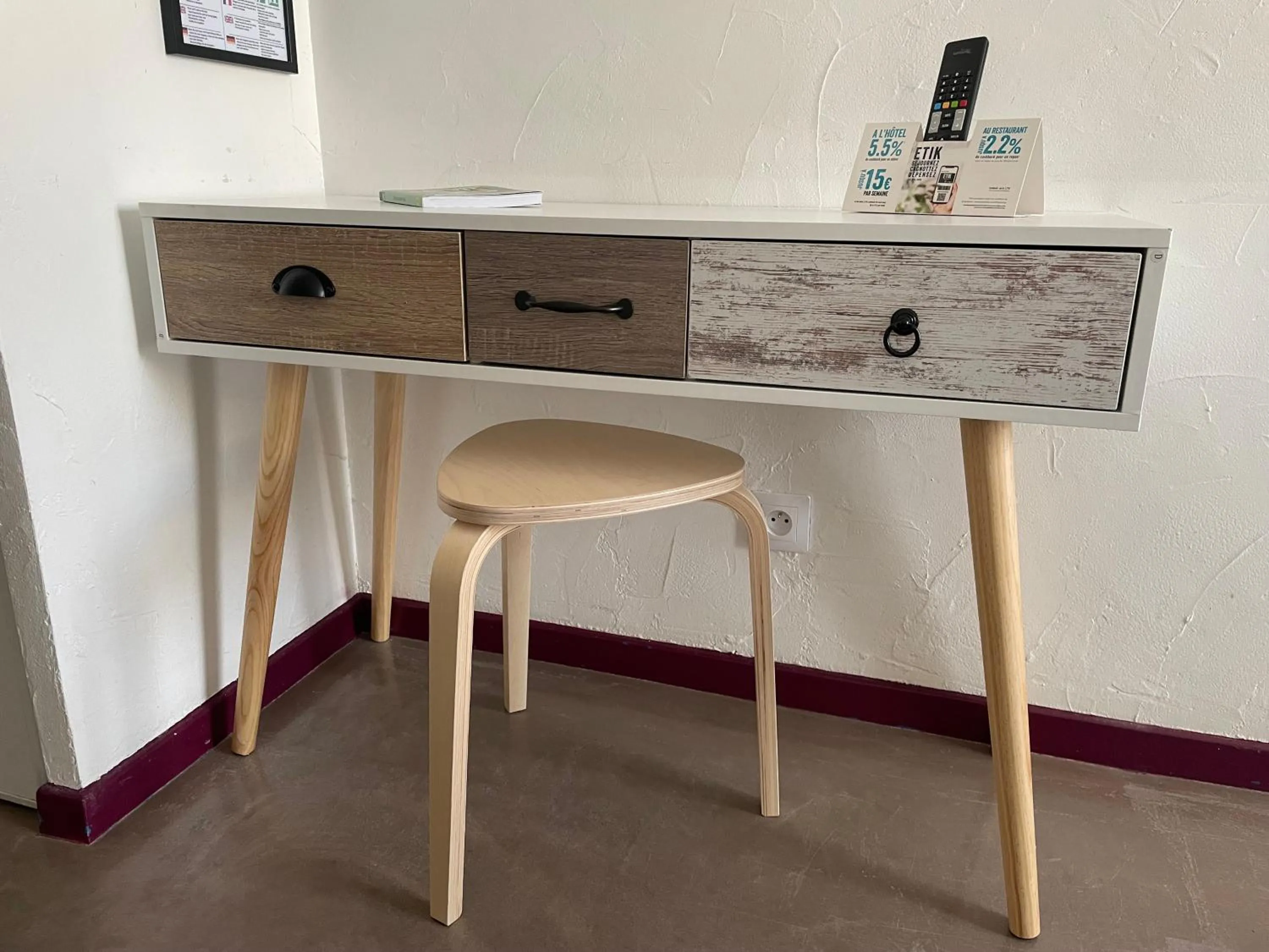 Bedroom in Logis Hotel De La Clape