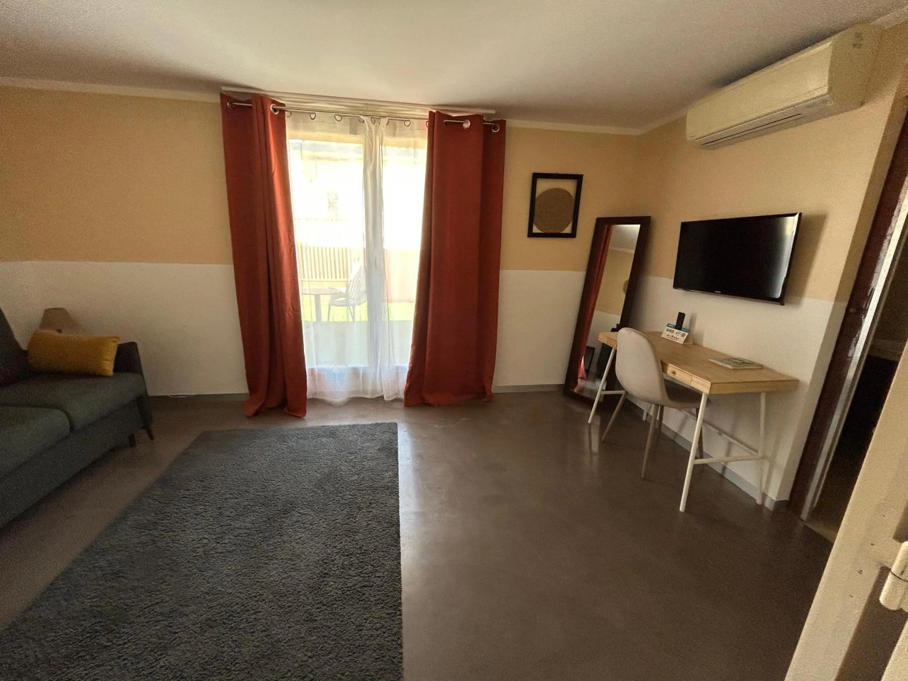 Living room in Logis Hotel De La Clape