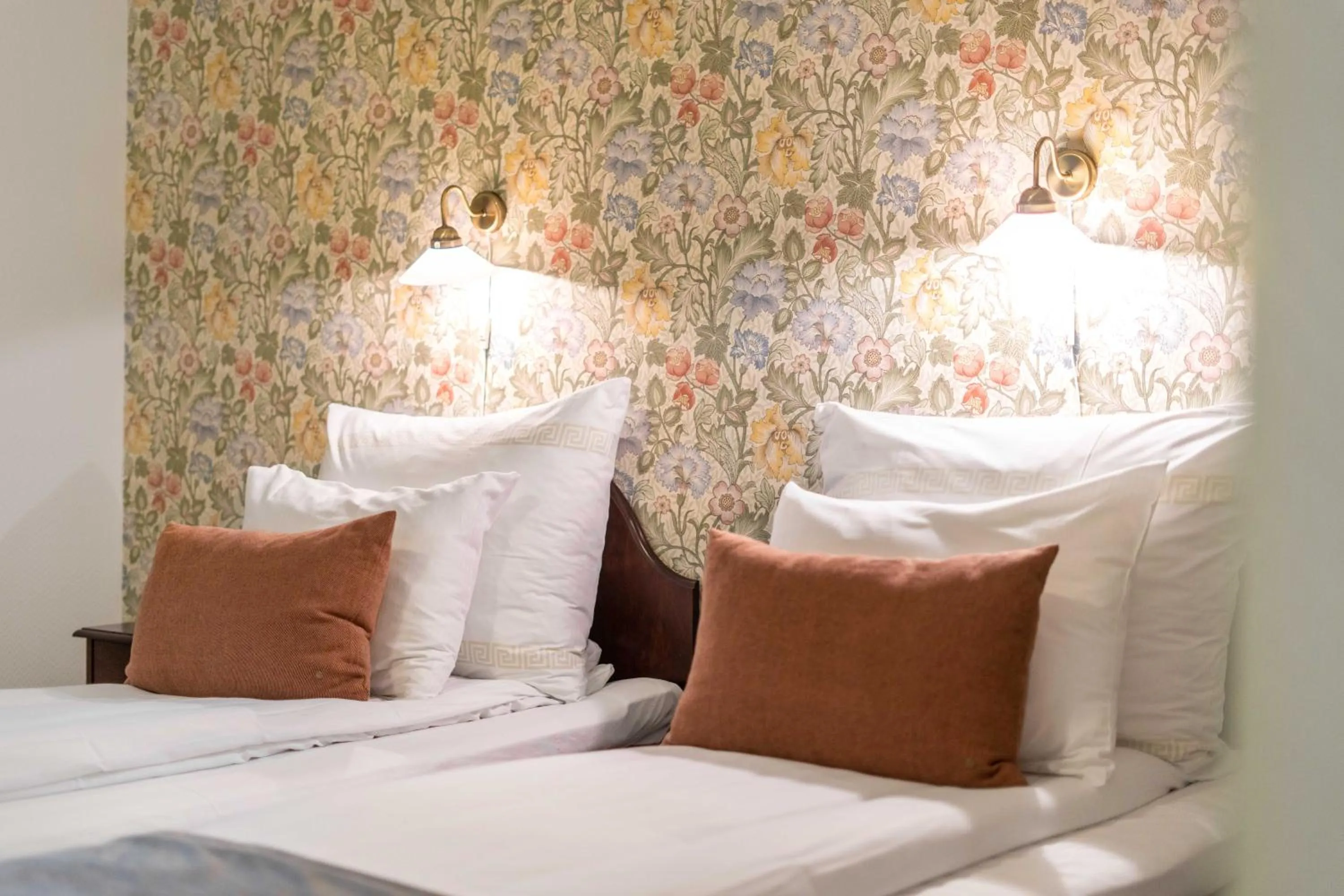 Bed in Kronen Gaard Hotel