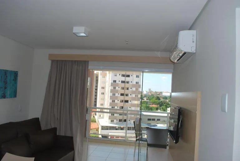 Communal lounge/ TV room in Casa da Madeira Caldas Novas - ACHEI FERIAS - Com Roupa de Cama