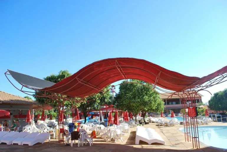 Communal lounge/ TV room in diRoma Fiori Caldas Novas - ACHEI FERIAS - Com Roupa de Cama