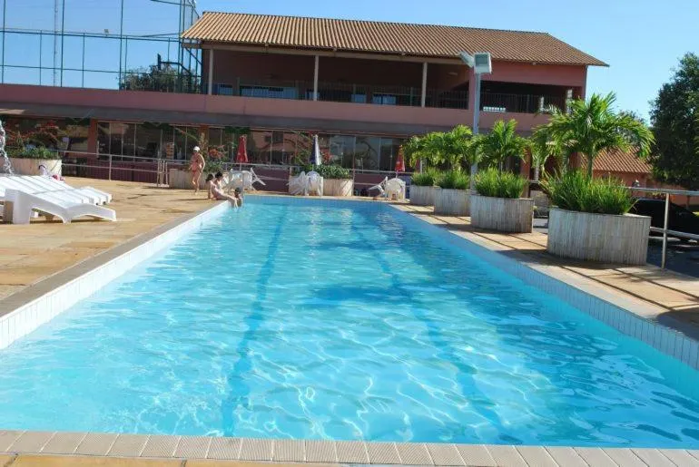 Swimming pool in diRoma Fiori Caldas Novas - ACHEI FERIAS - Com Roupa de Cama