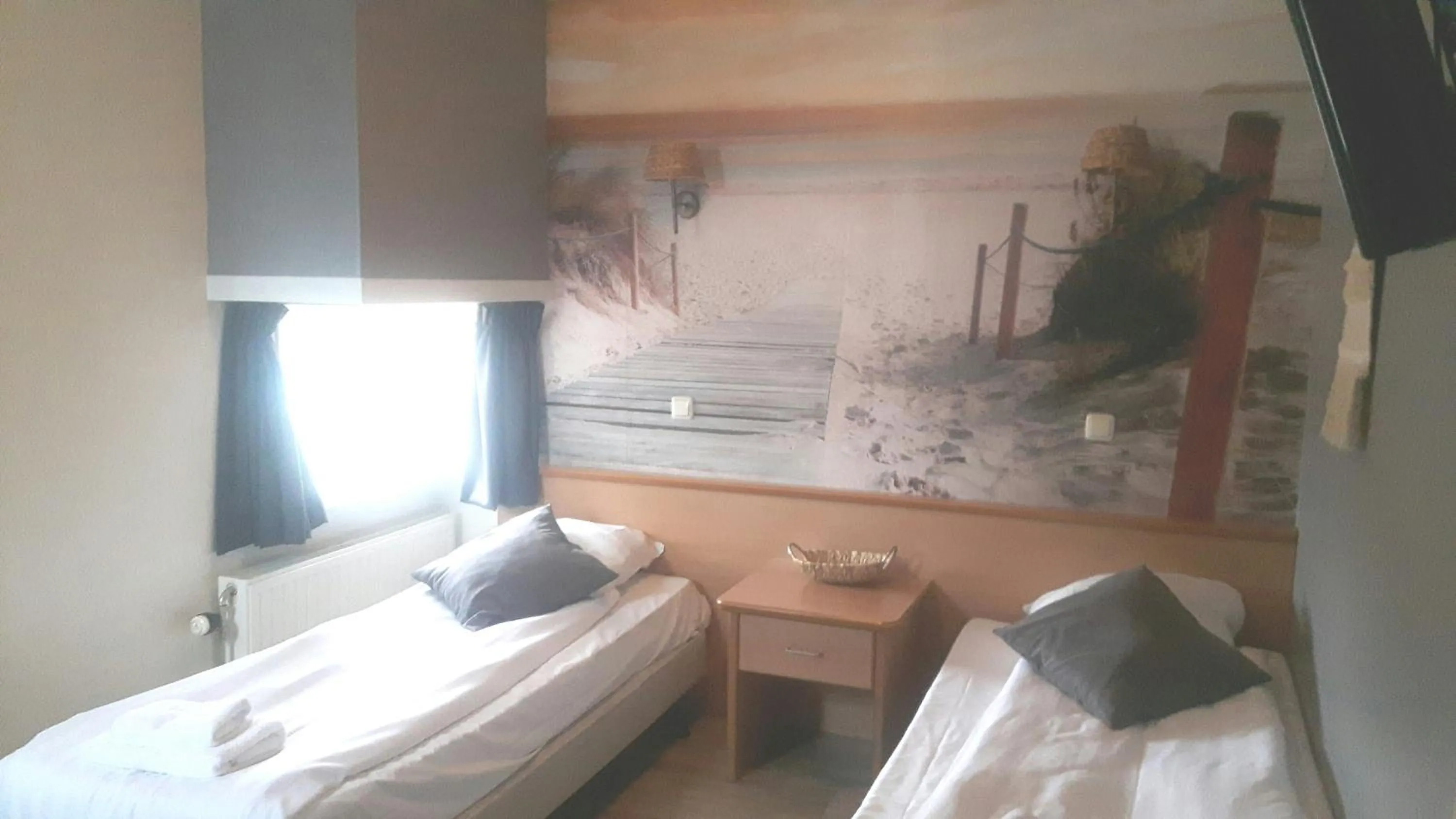 Photo of the whole room, Bed in Hotel Velsen