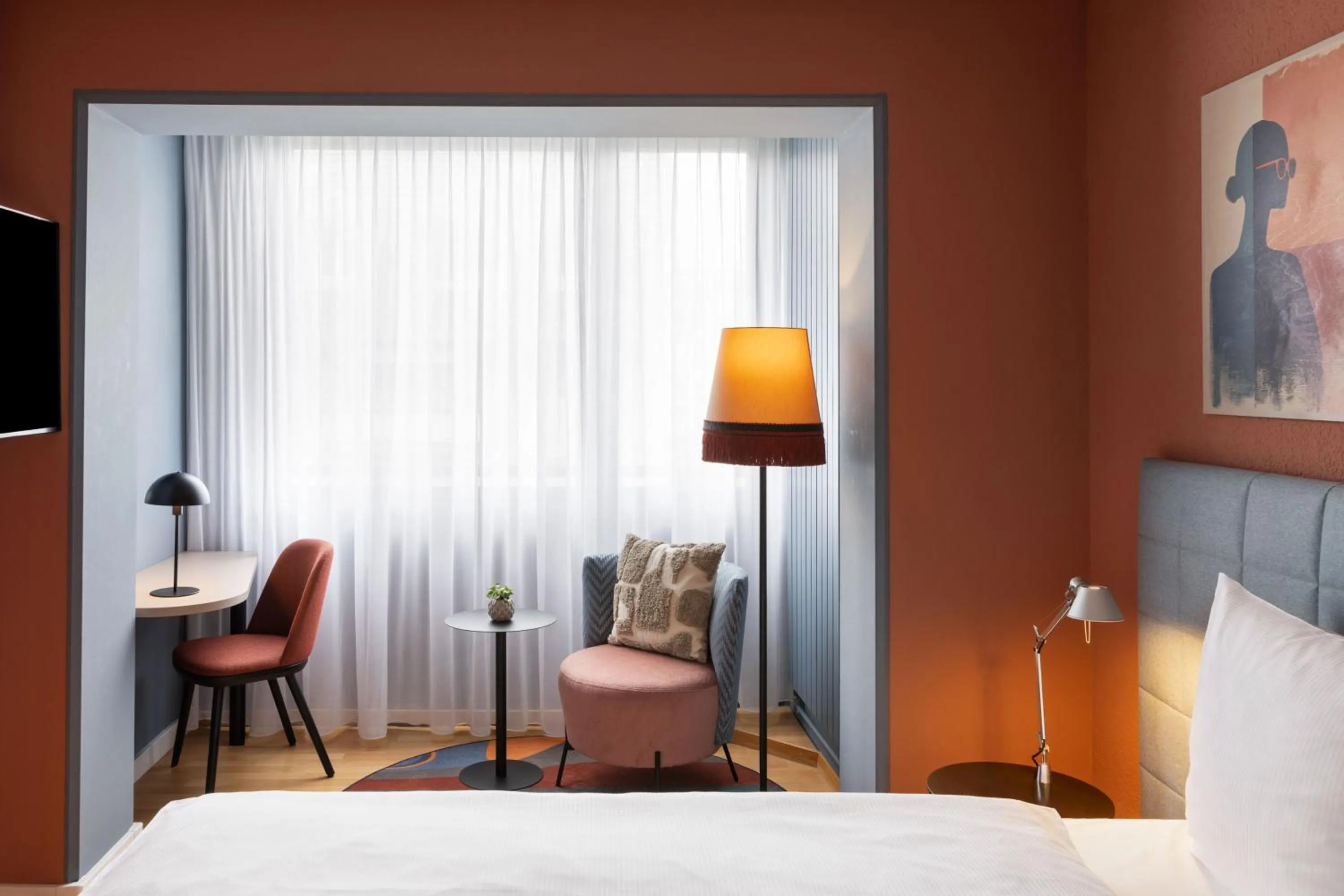 Seating area, Bed in Hotel La Pergola