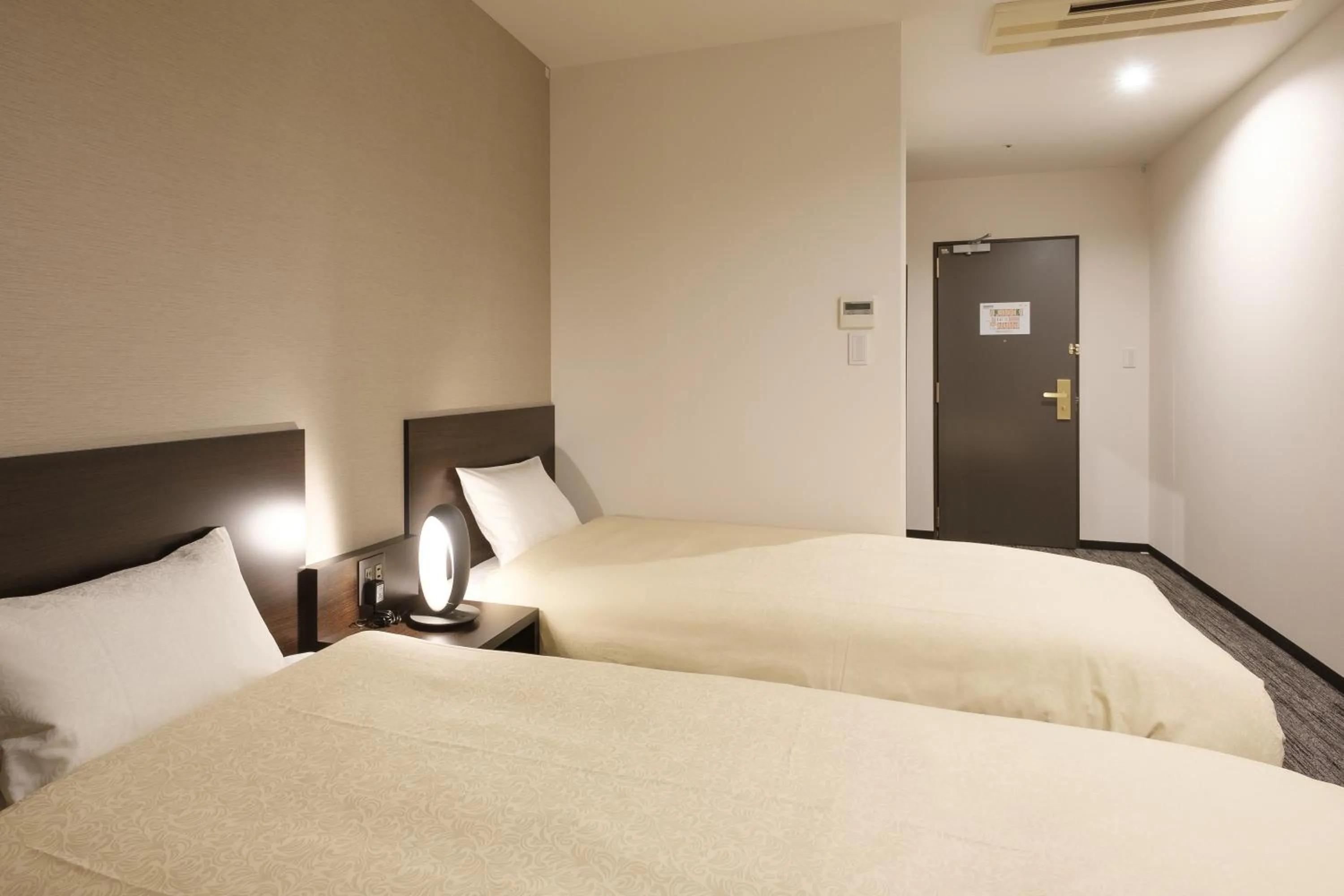 Bed in The Premium Hotel In Rinku