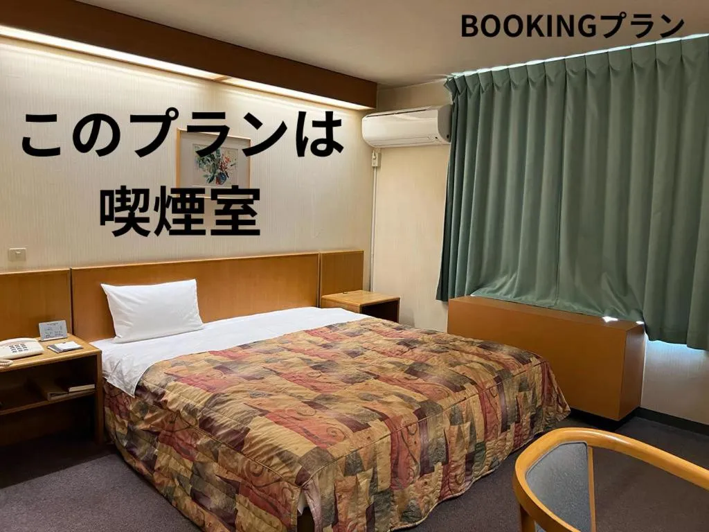 Property building, Bed in Hotel Kuki