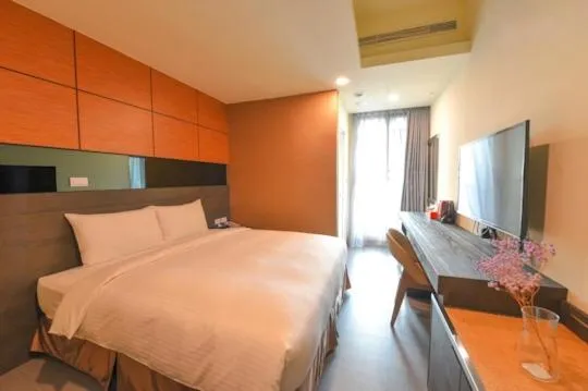 Bed in San Juan Easy Stay Inn Tainan