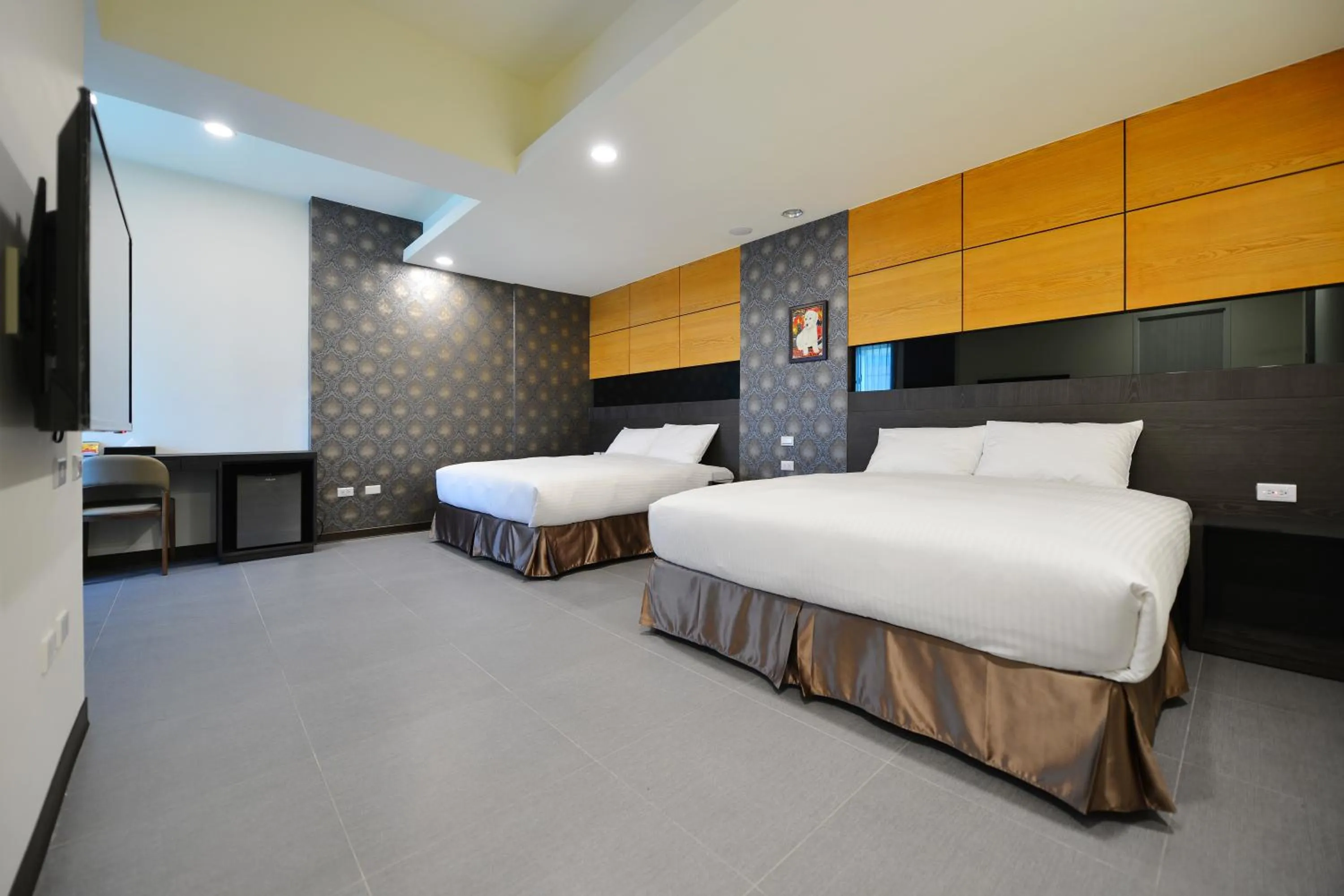 Bed in San Juan Easy Stay Inn Tainan