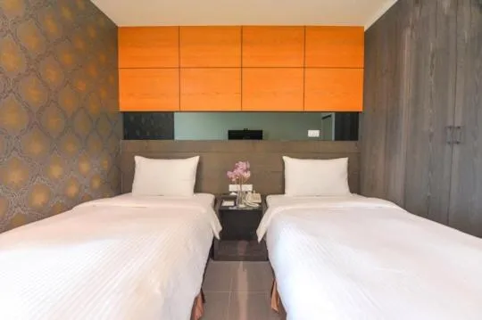 Bed in San Juan Easy Stay Inn Tainan