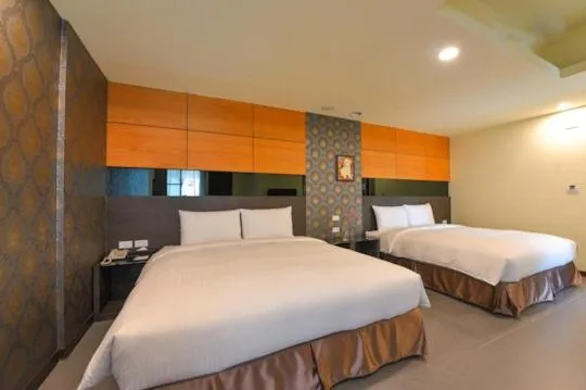 Bed in San Juan Easy Stay Inn Tainan