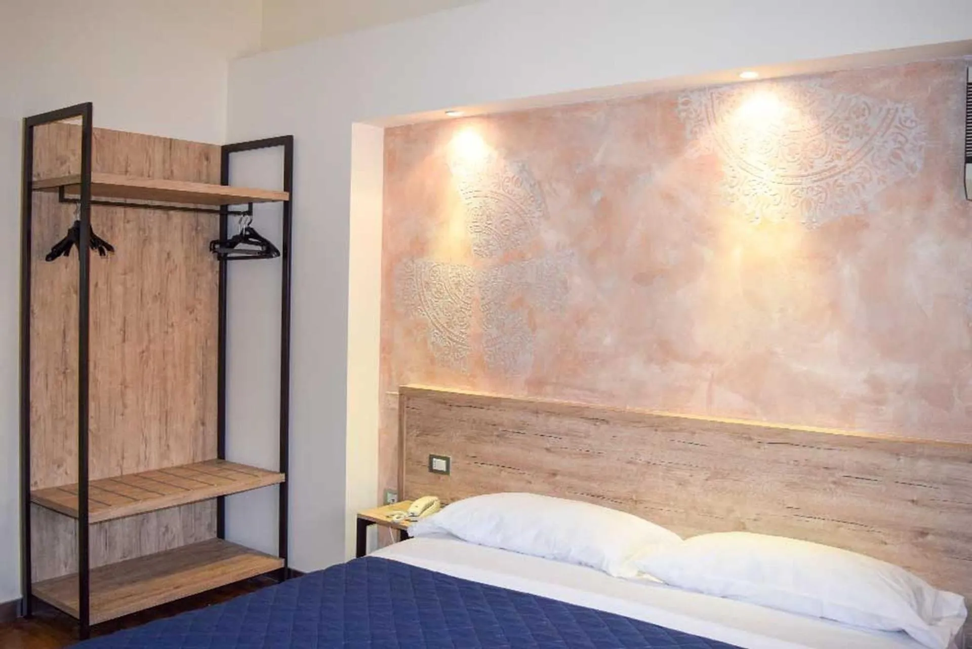 Bedroom in Le Grazie Hotel