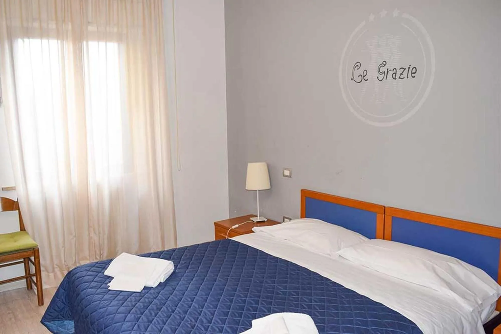 Bed in Le Grazie Hotel