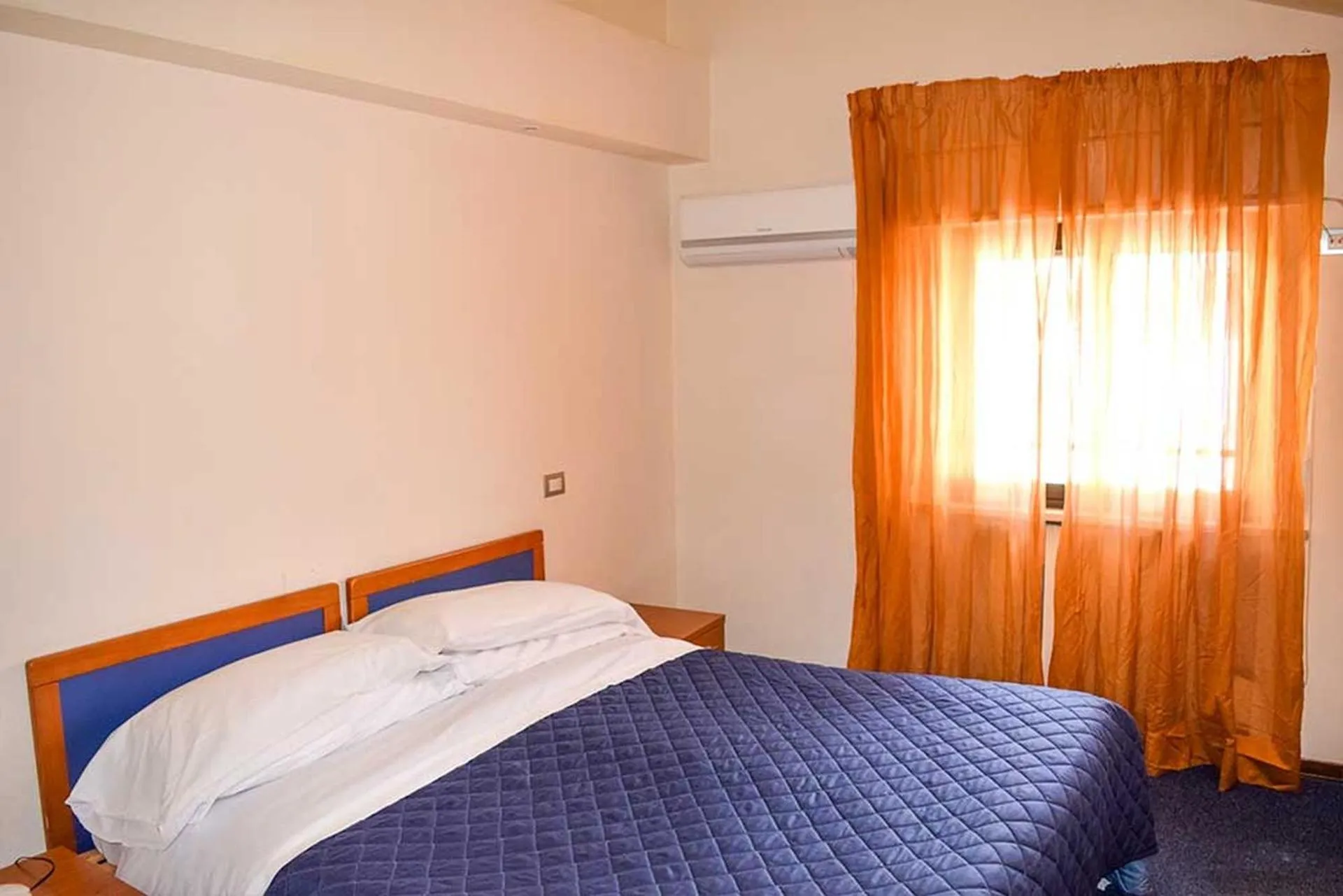 Bed in Le Grazie Hotel