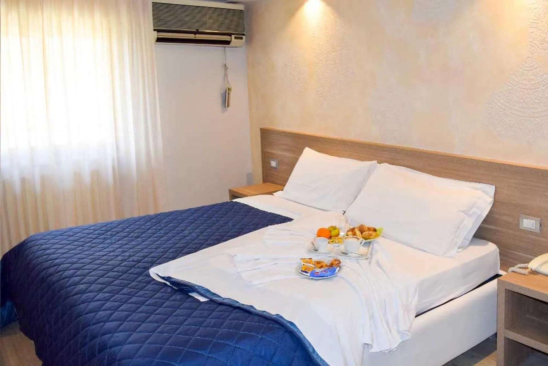 Bedroom in Le Grazie Hotel