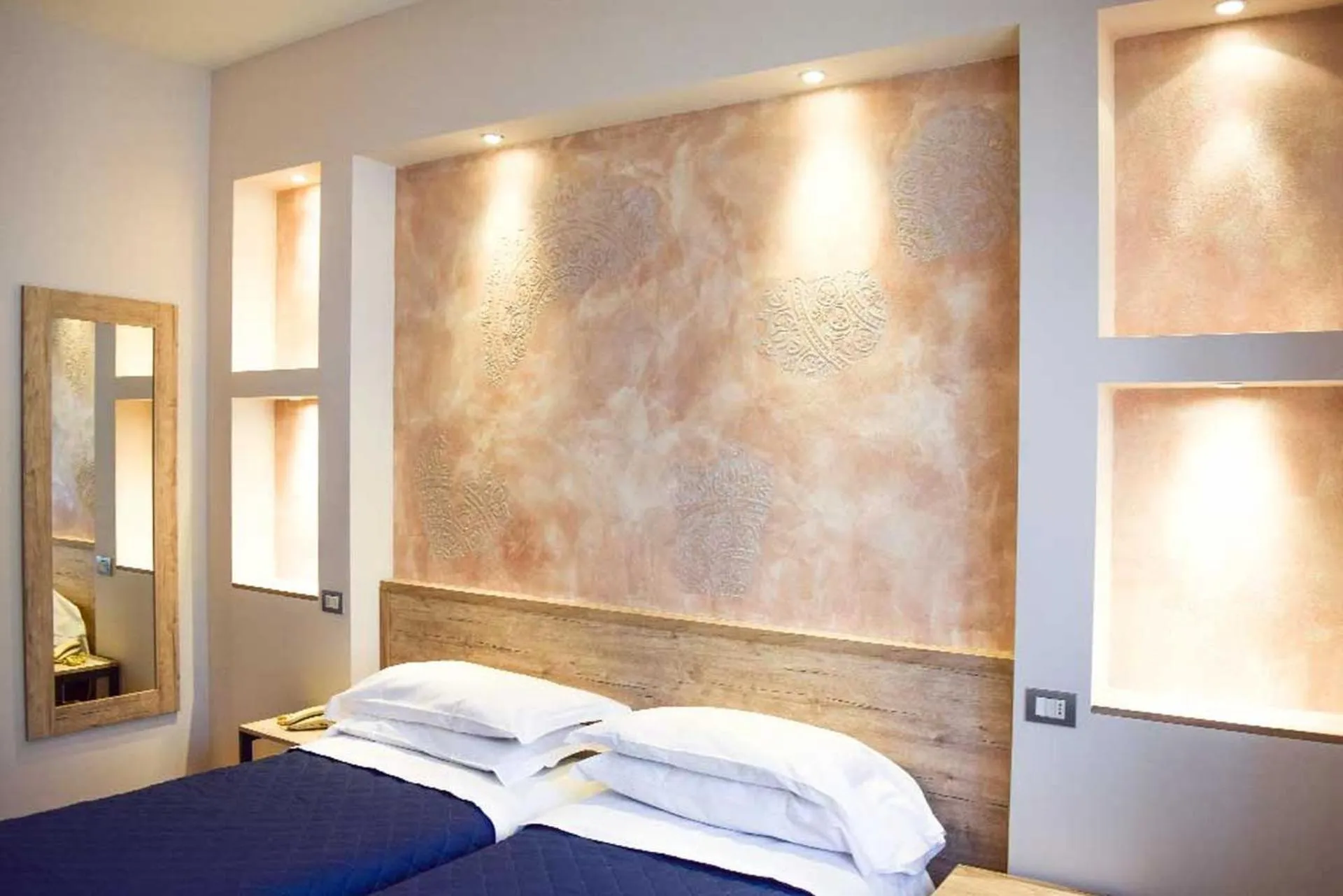 Bedroom in Le Grazie Hotel