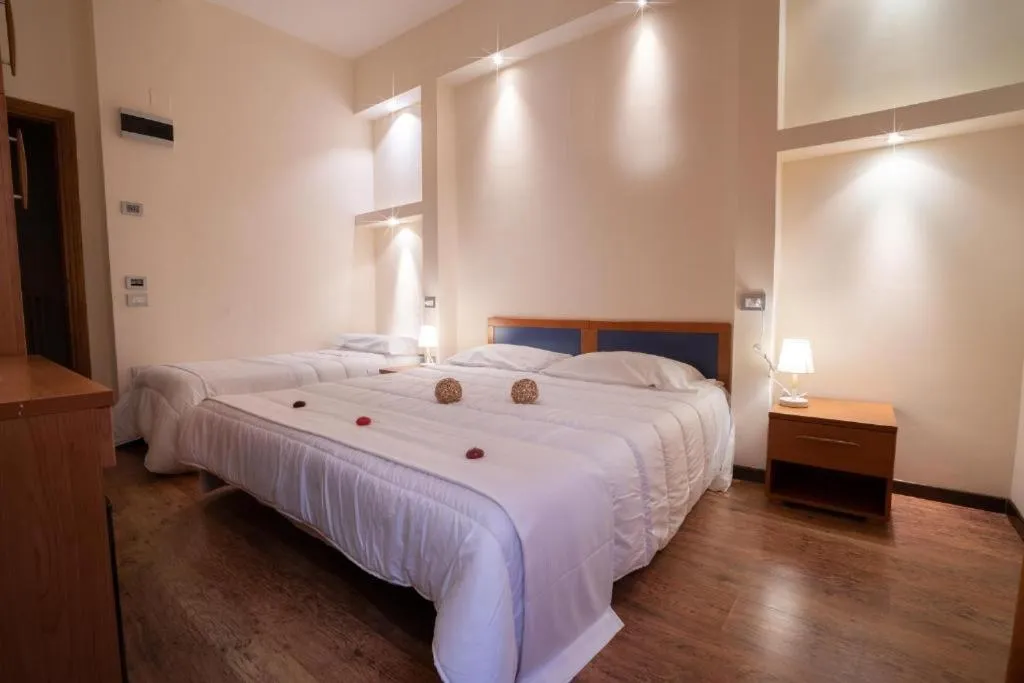 Bedroom in Le Grazie Hotel