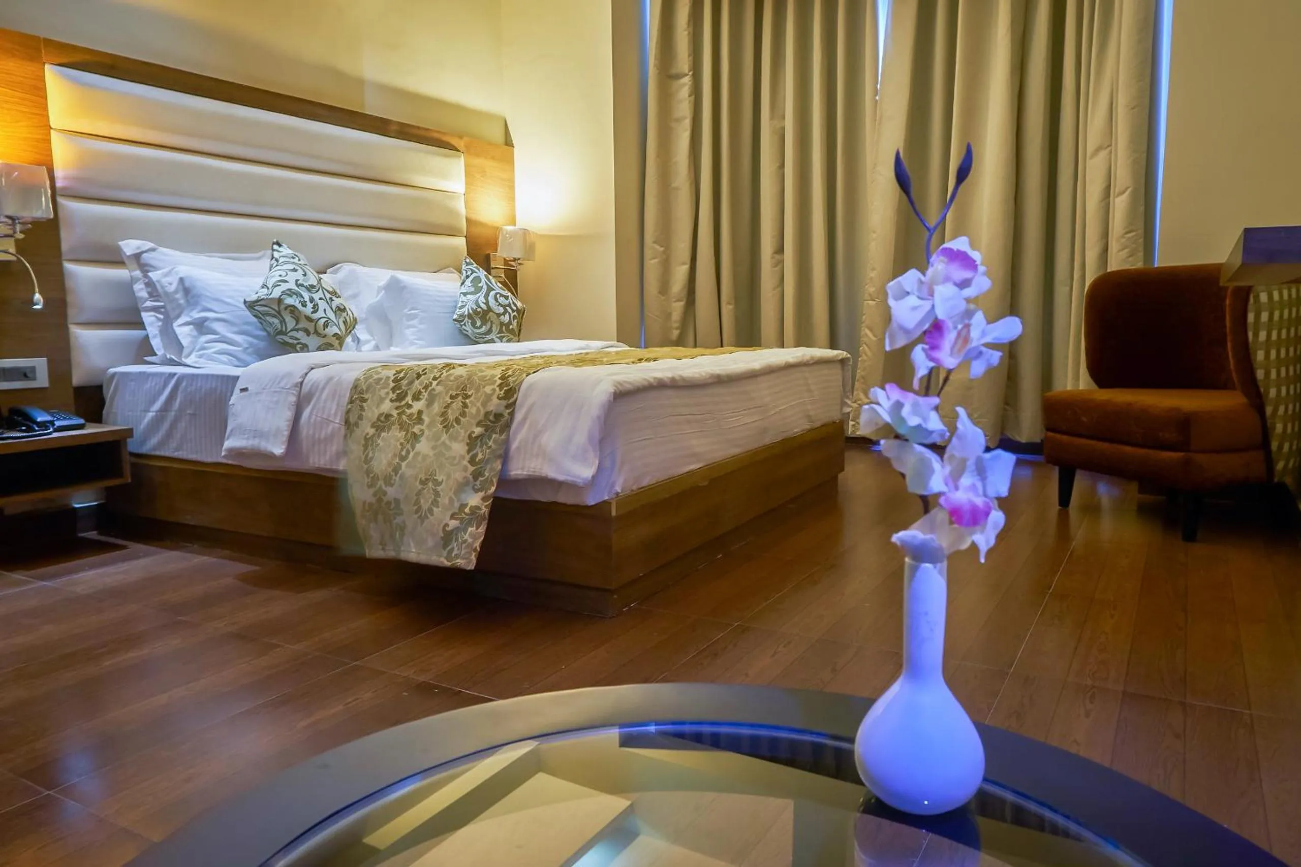 Photo of the whole room, Bed in Ganpati Hotel Katra