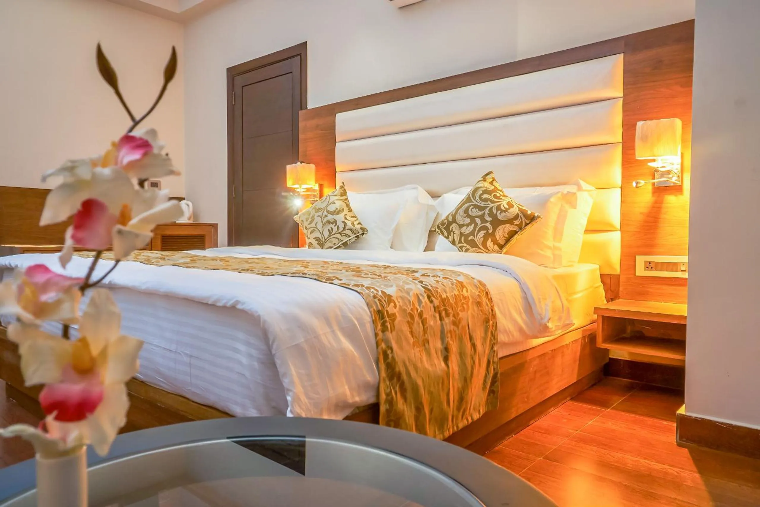 Photo of the whole room, Bed in Ganpati Hotel Katra