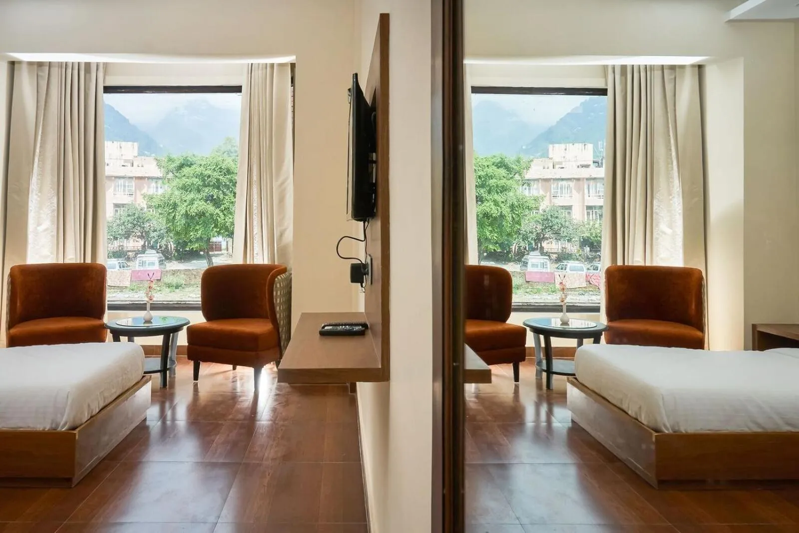 Photo of the whole room, Bed in Ganpati Hotel Katra