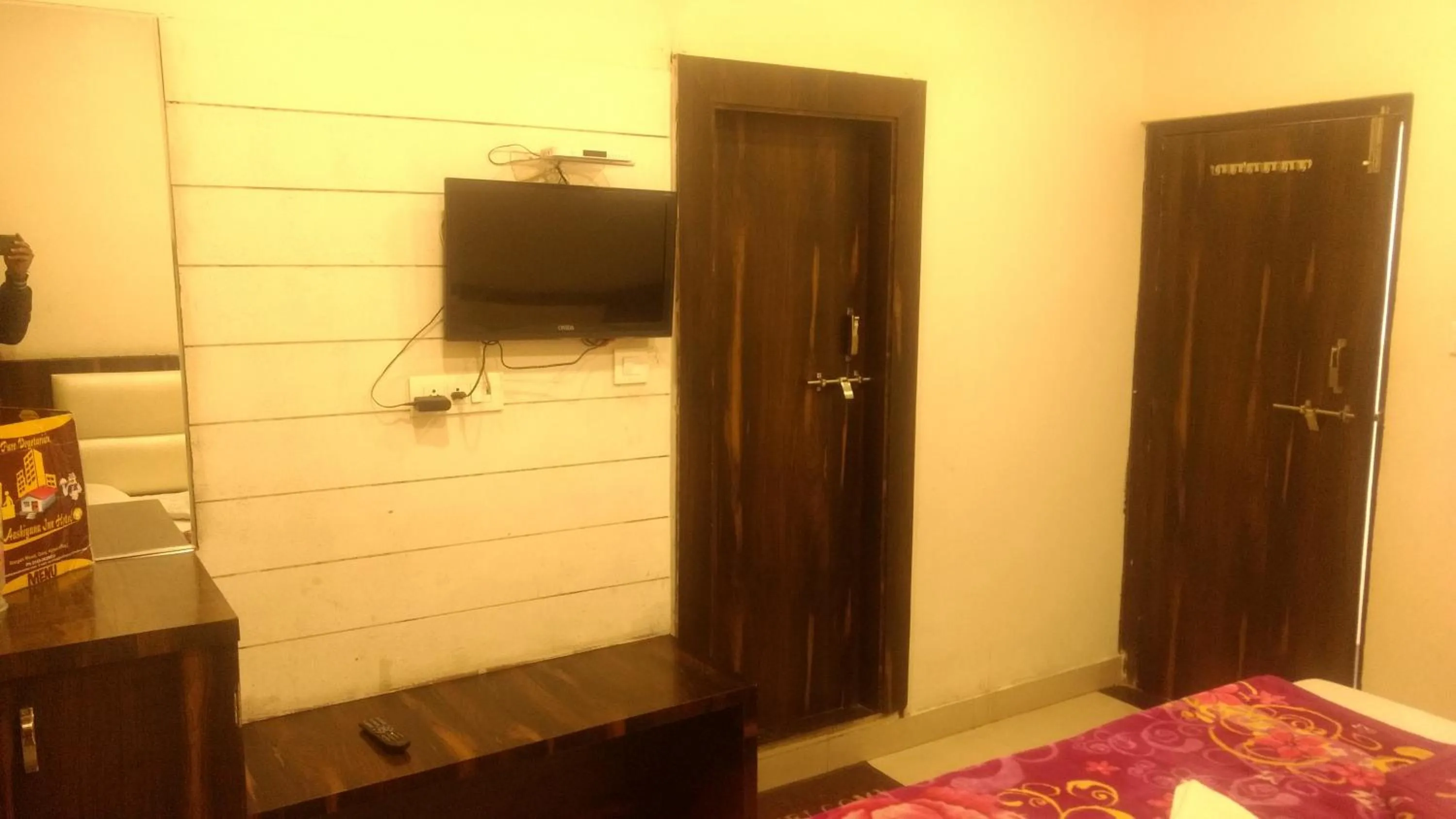Bed in Ashiyana Inn Hotel