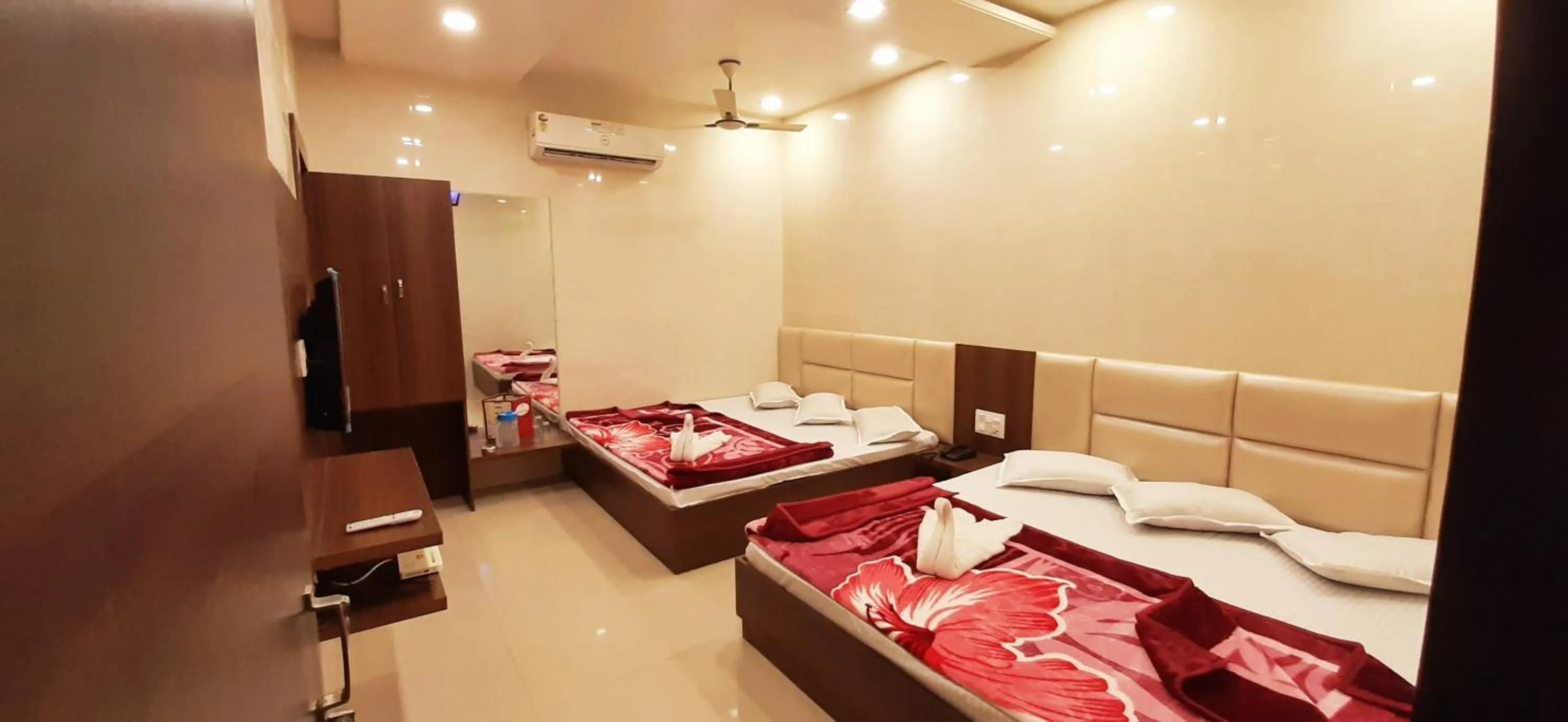 Bed in Ashiyana Inn Hotel