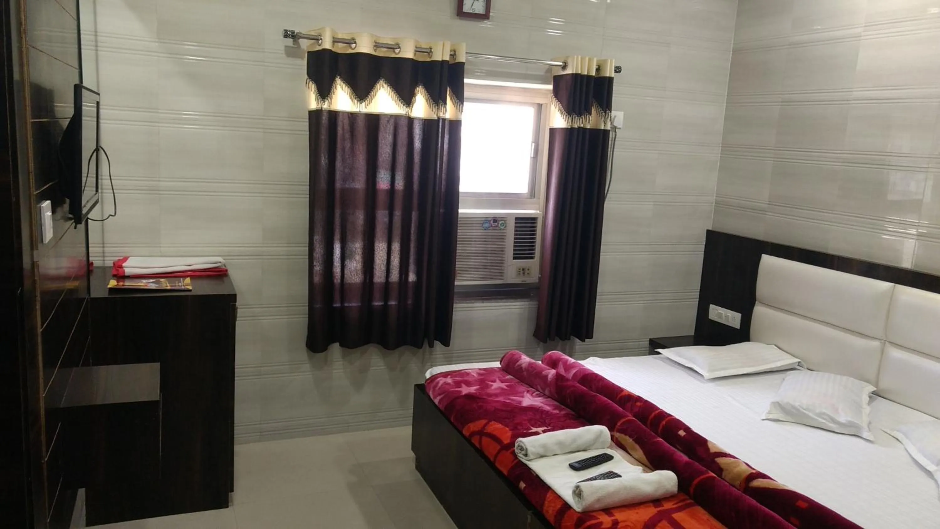 Bed in Ashiyana Inn Hotel