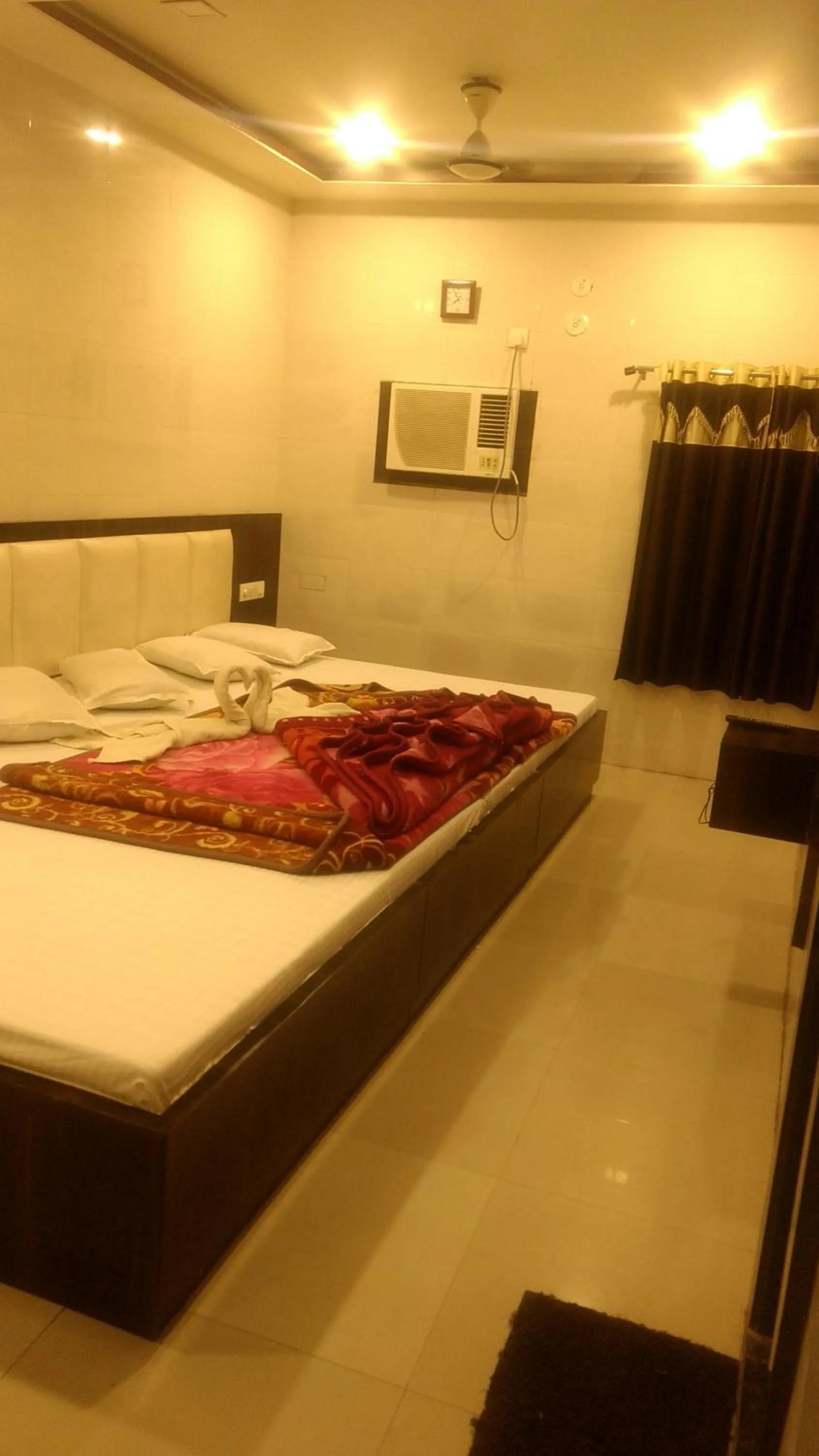 Bed in Ashiyana Inn Hotel
