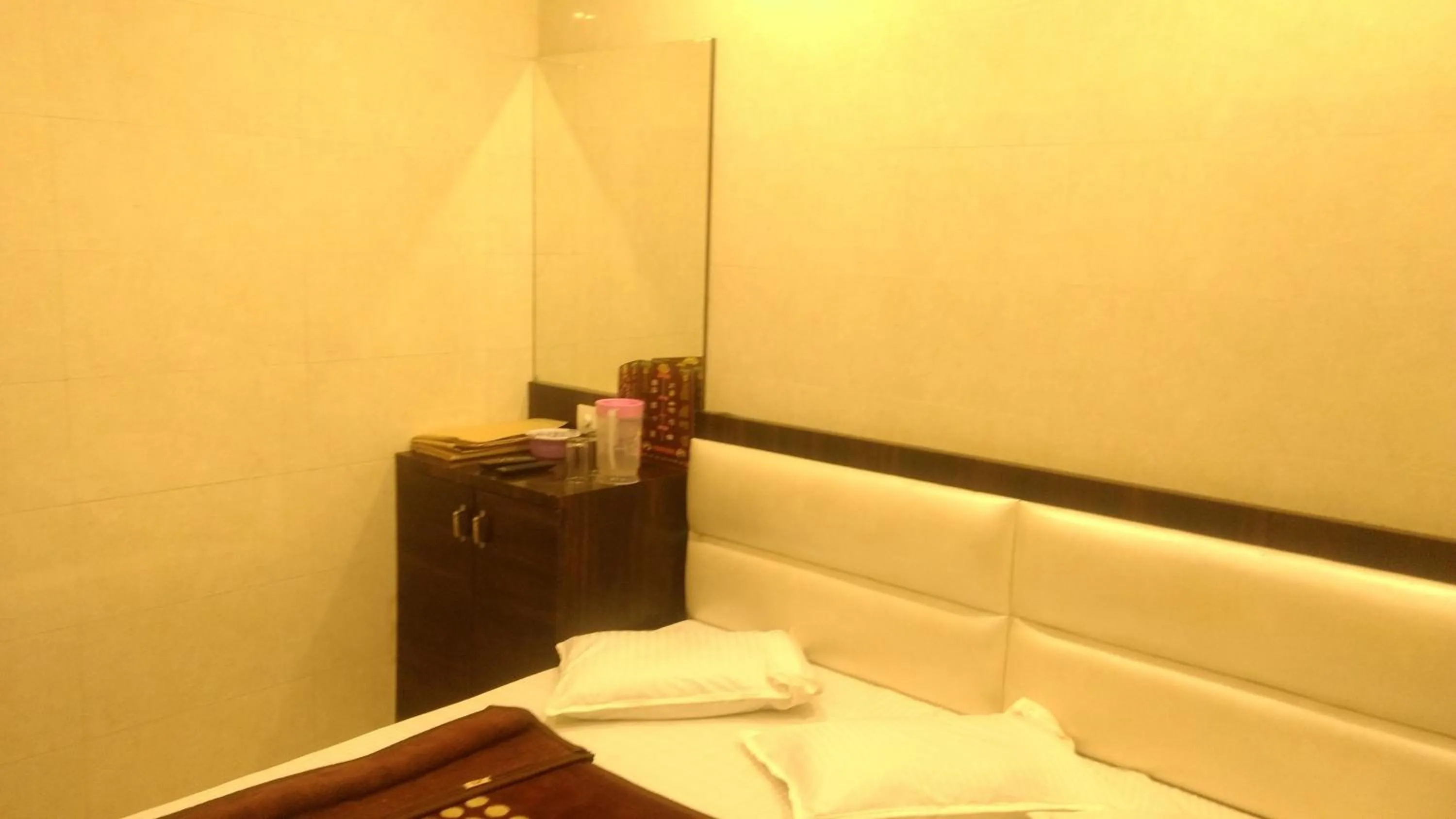 Bed in Ashiyana Inn Hotel