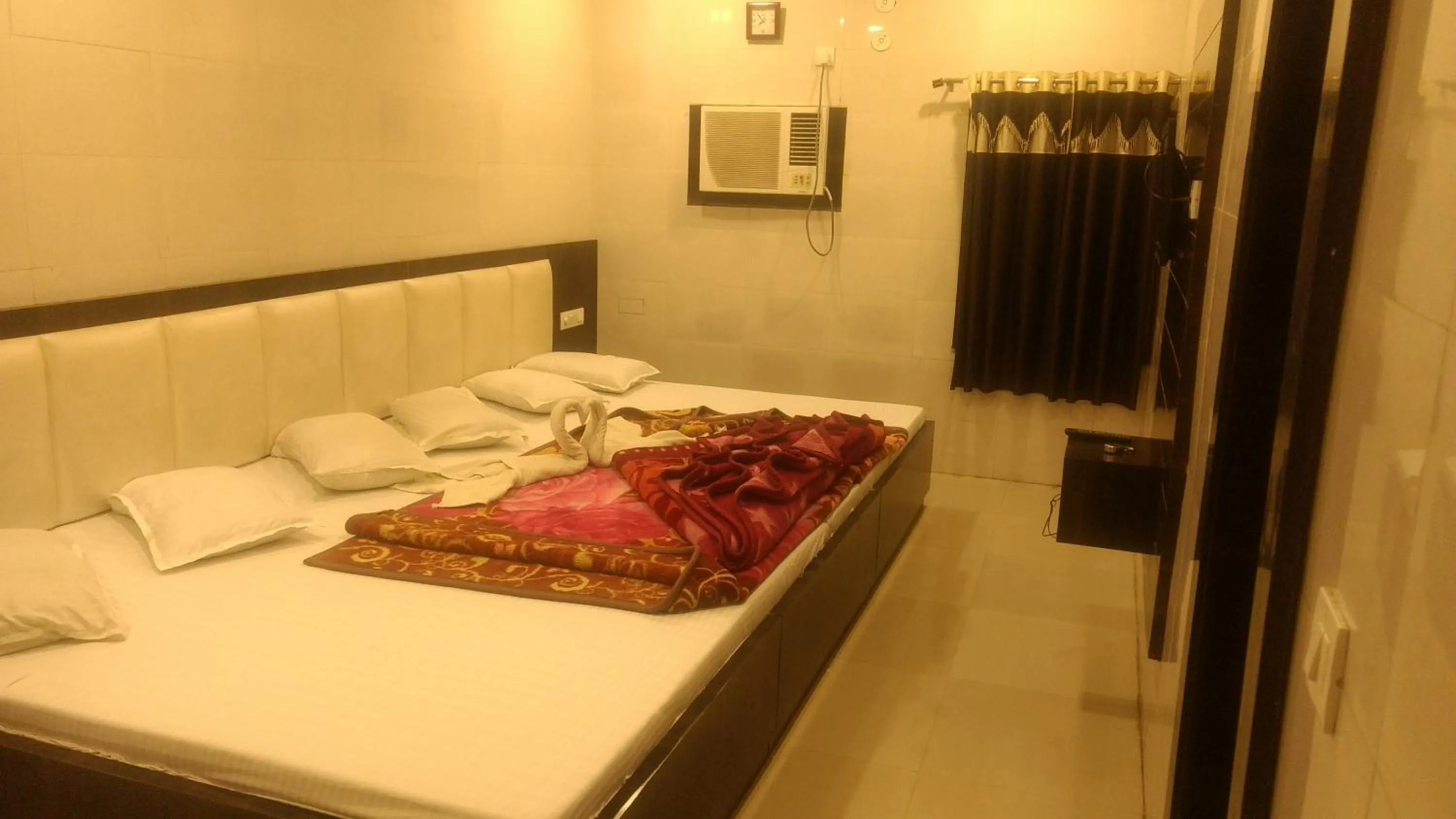 Bed in Ashiyana Inn Hotel