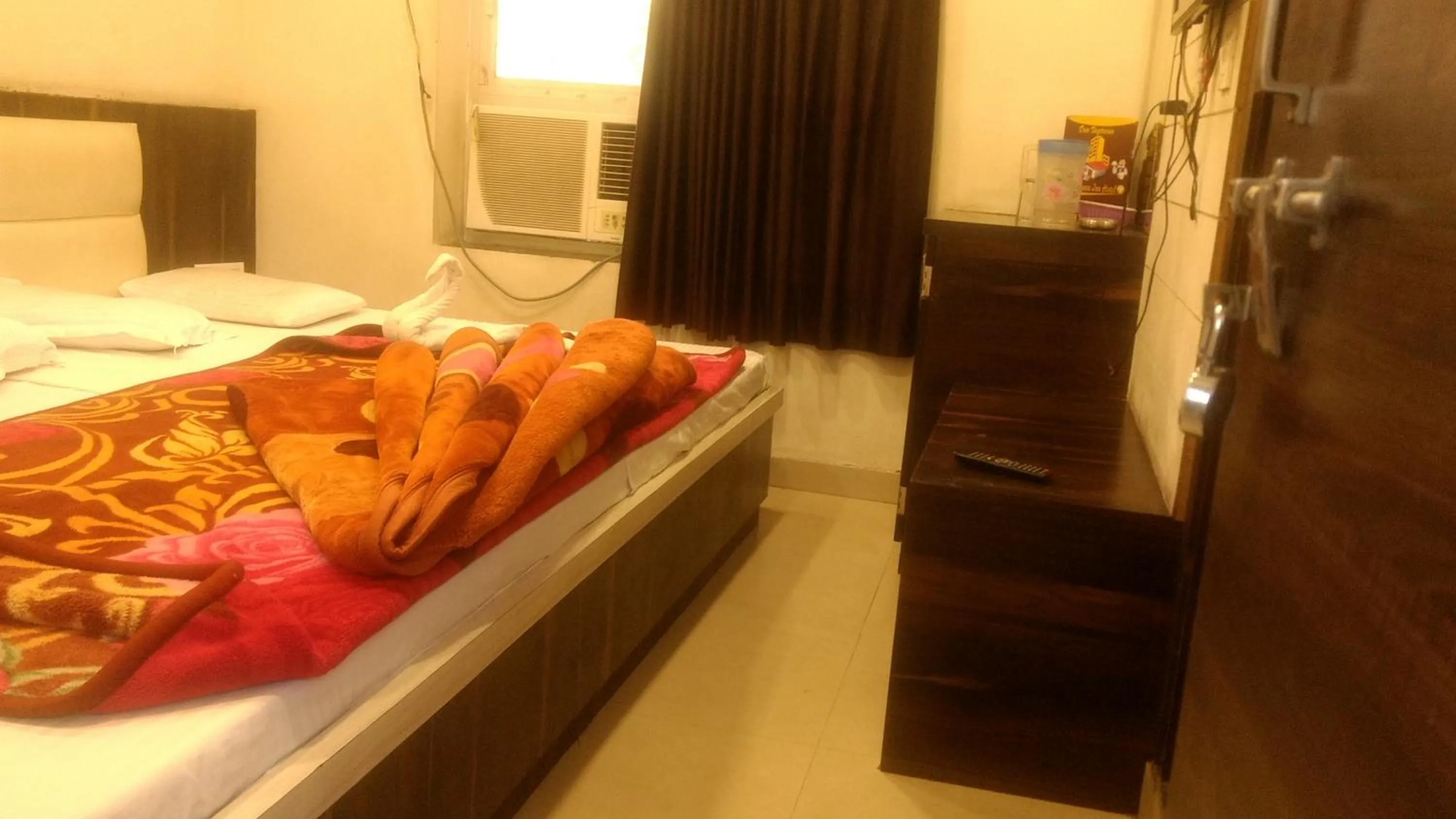 Bed in Ashiyana Inn Hotel