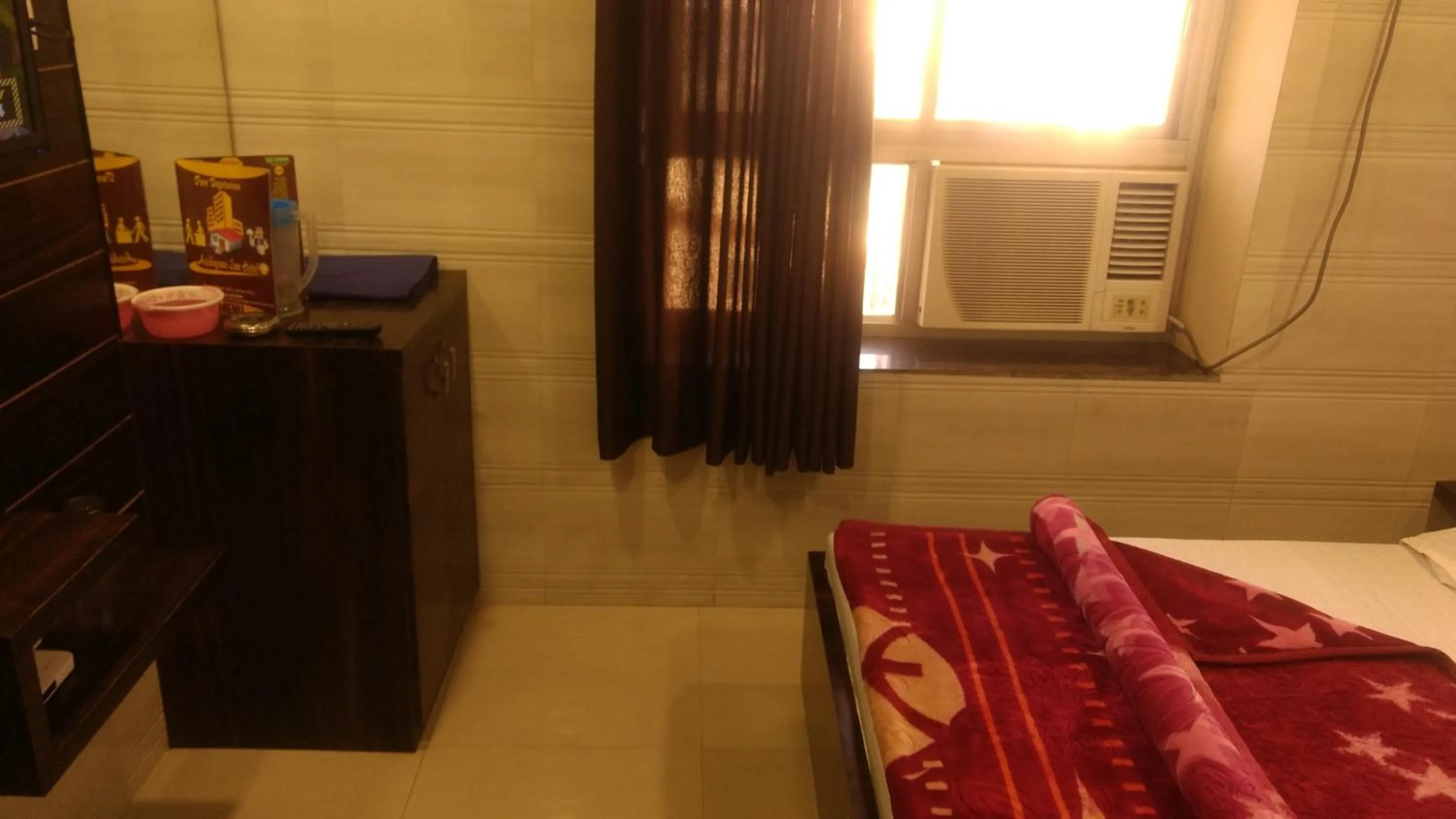 Bed in Ashiyana Inn Hotel