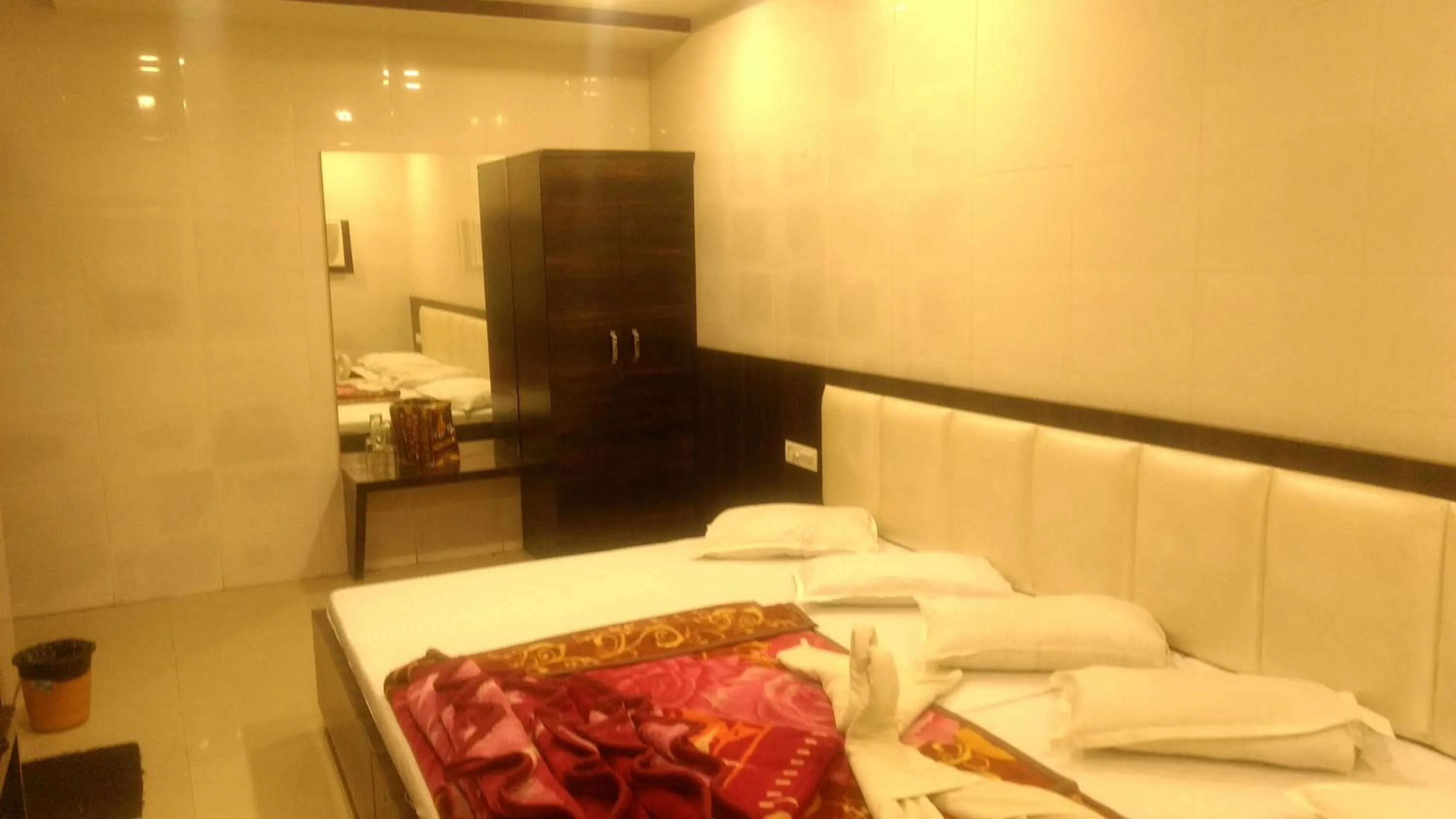 Bed in Ashiyana Inn Hotel