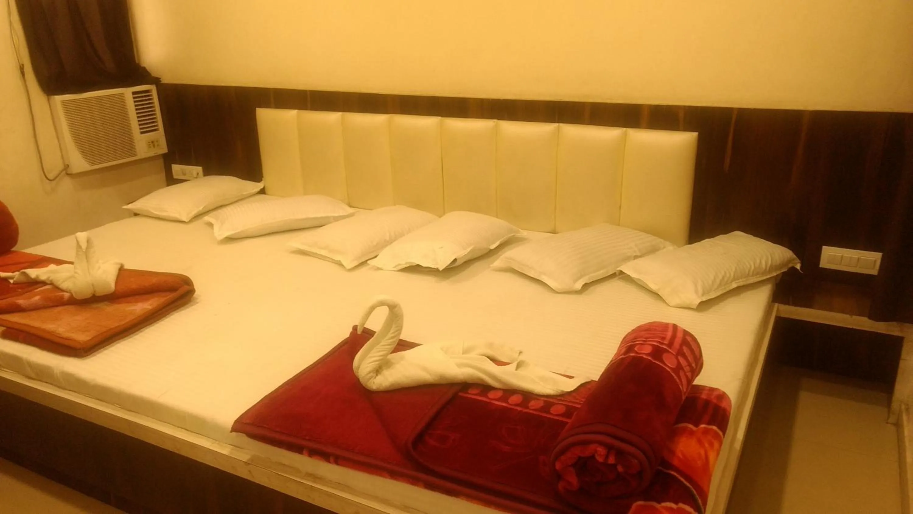 Bed in Ashiyana Inn Hotel