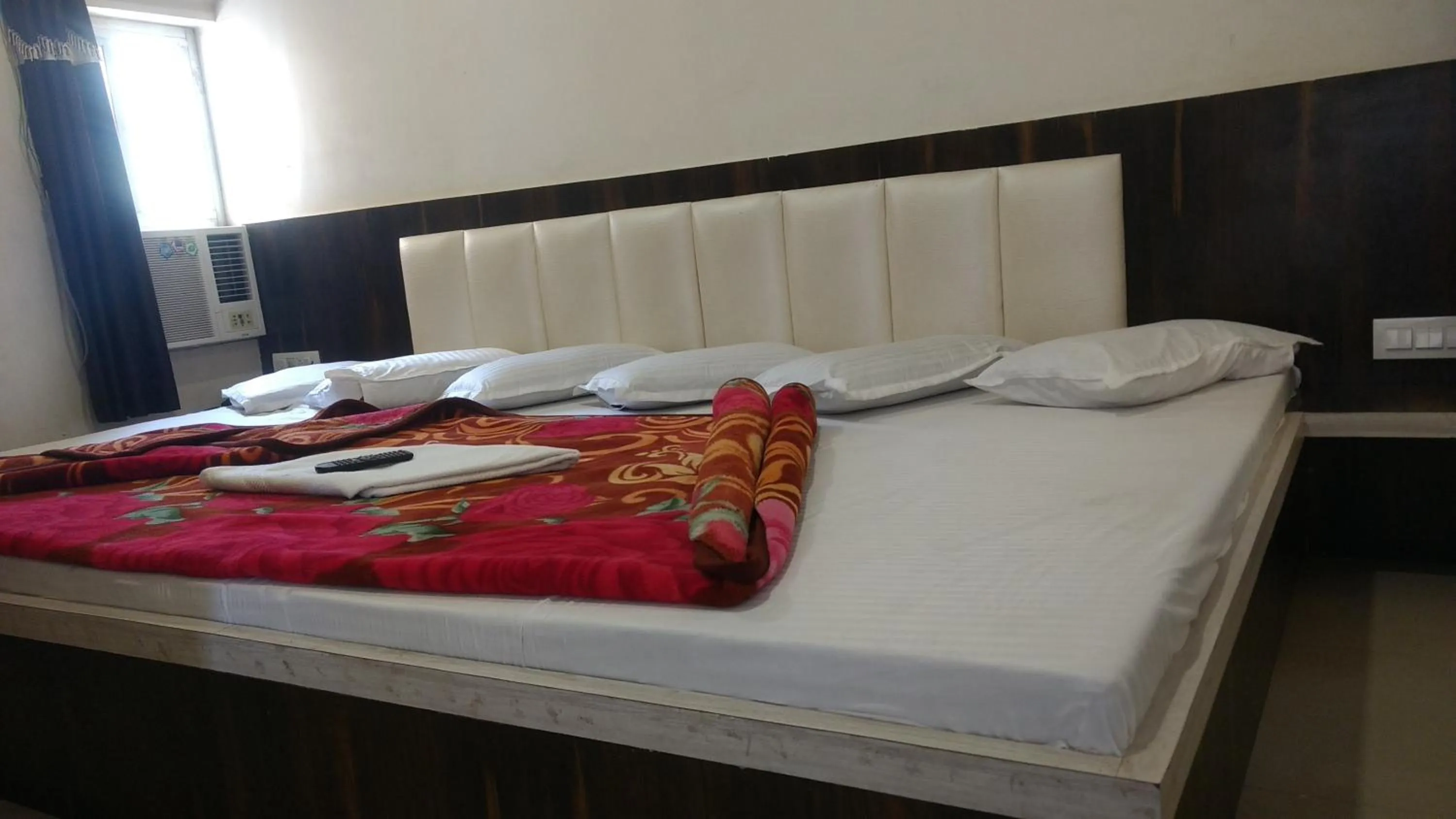 Bed in Ashiyana Inn Hotel
