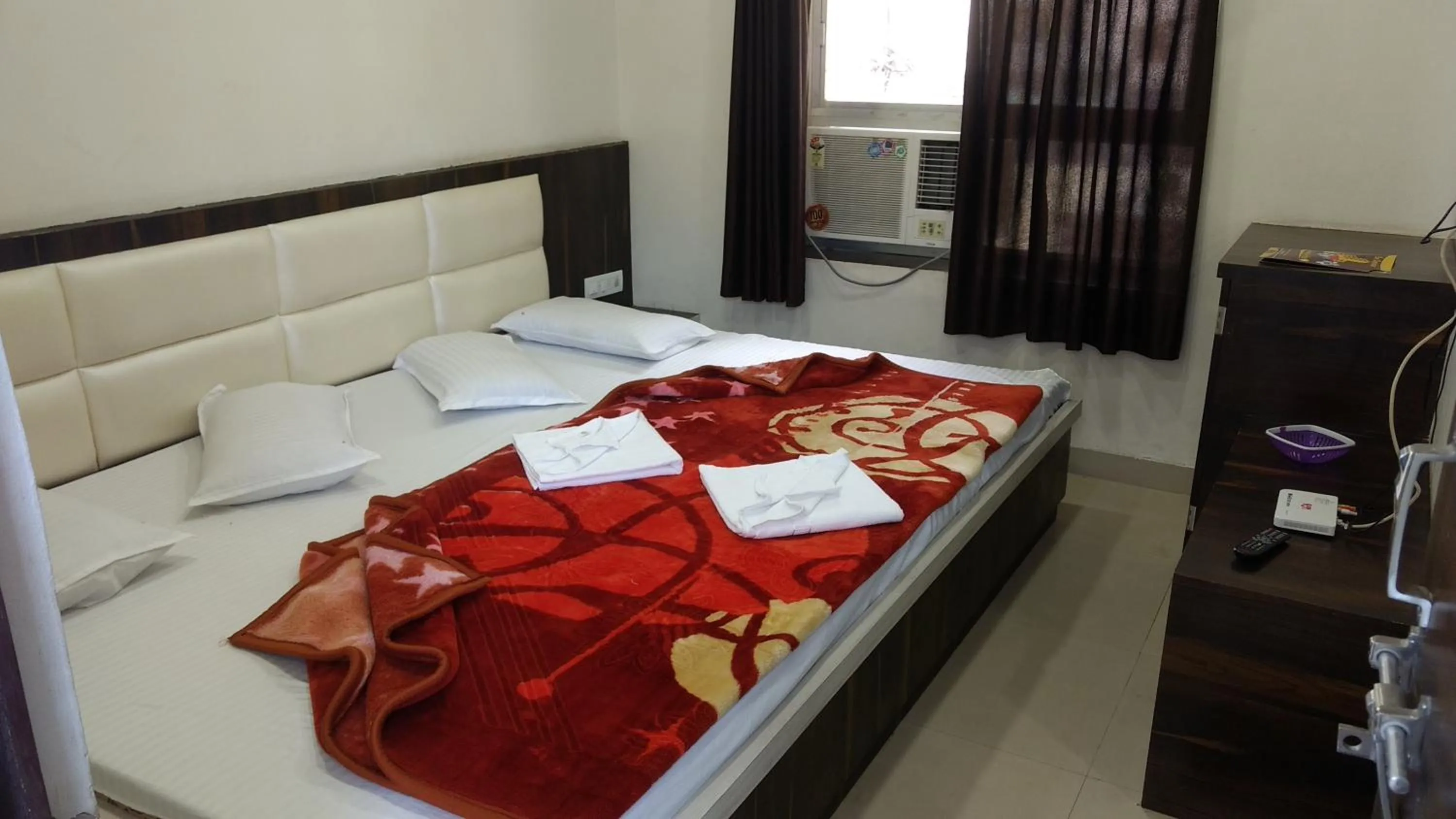 Bed in Ashiyana Inn Hotel