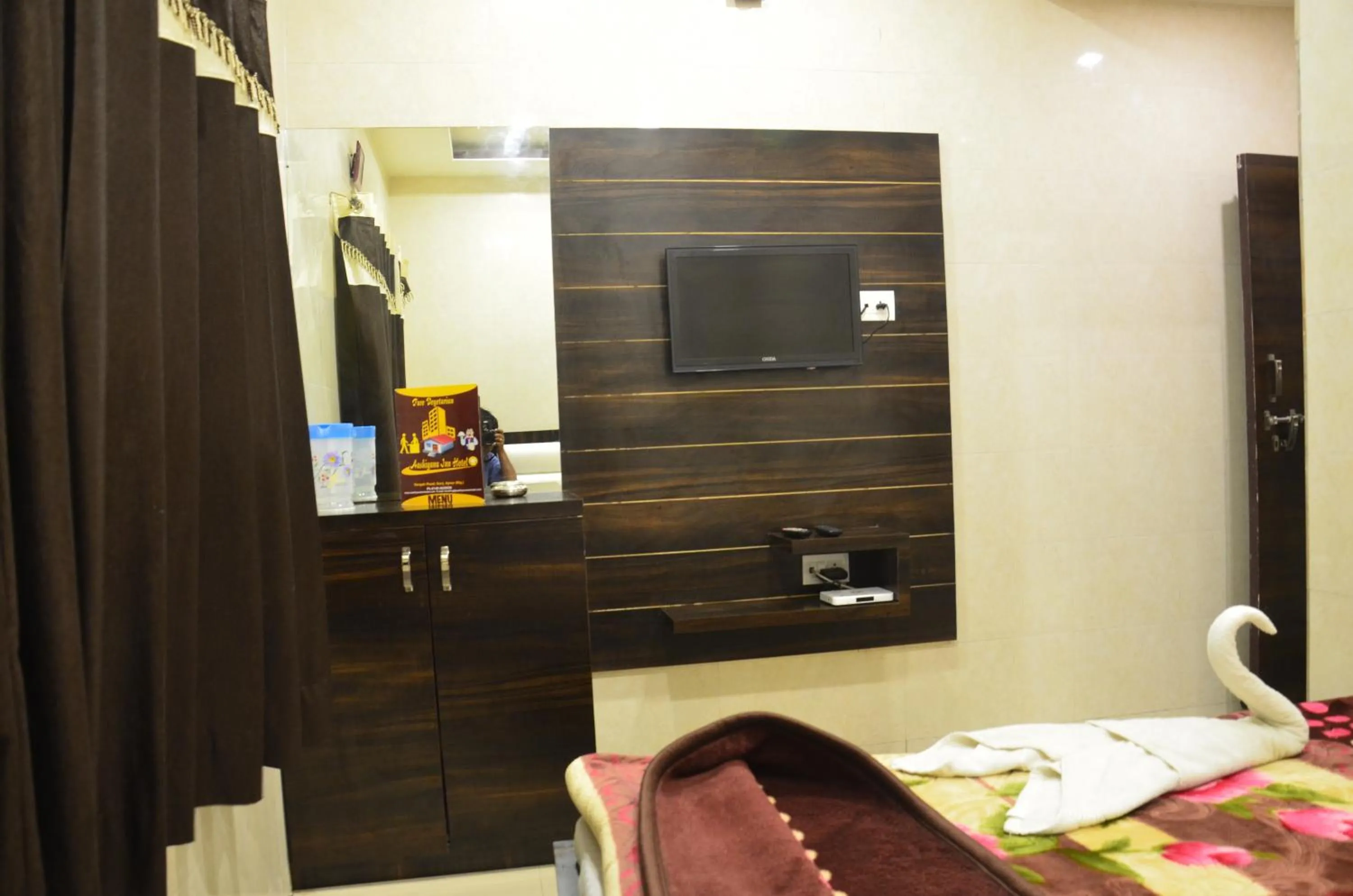 Bed in Ashiyana Inn Hotel