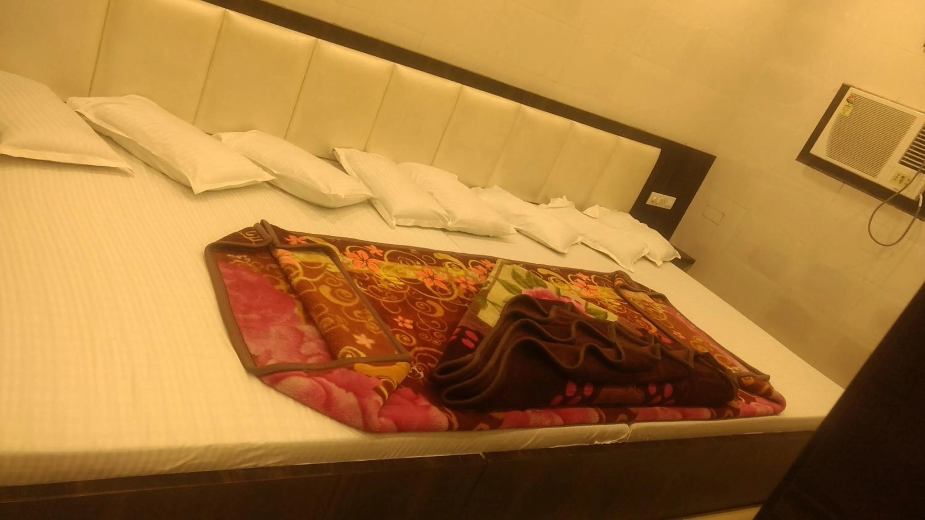 Bed in Ashiyana Inn Hotel
