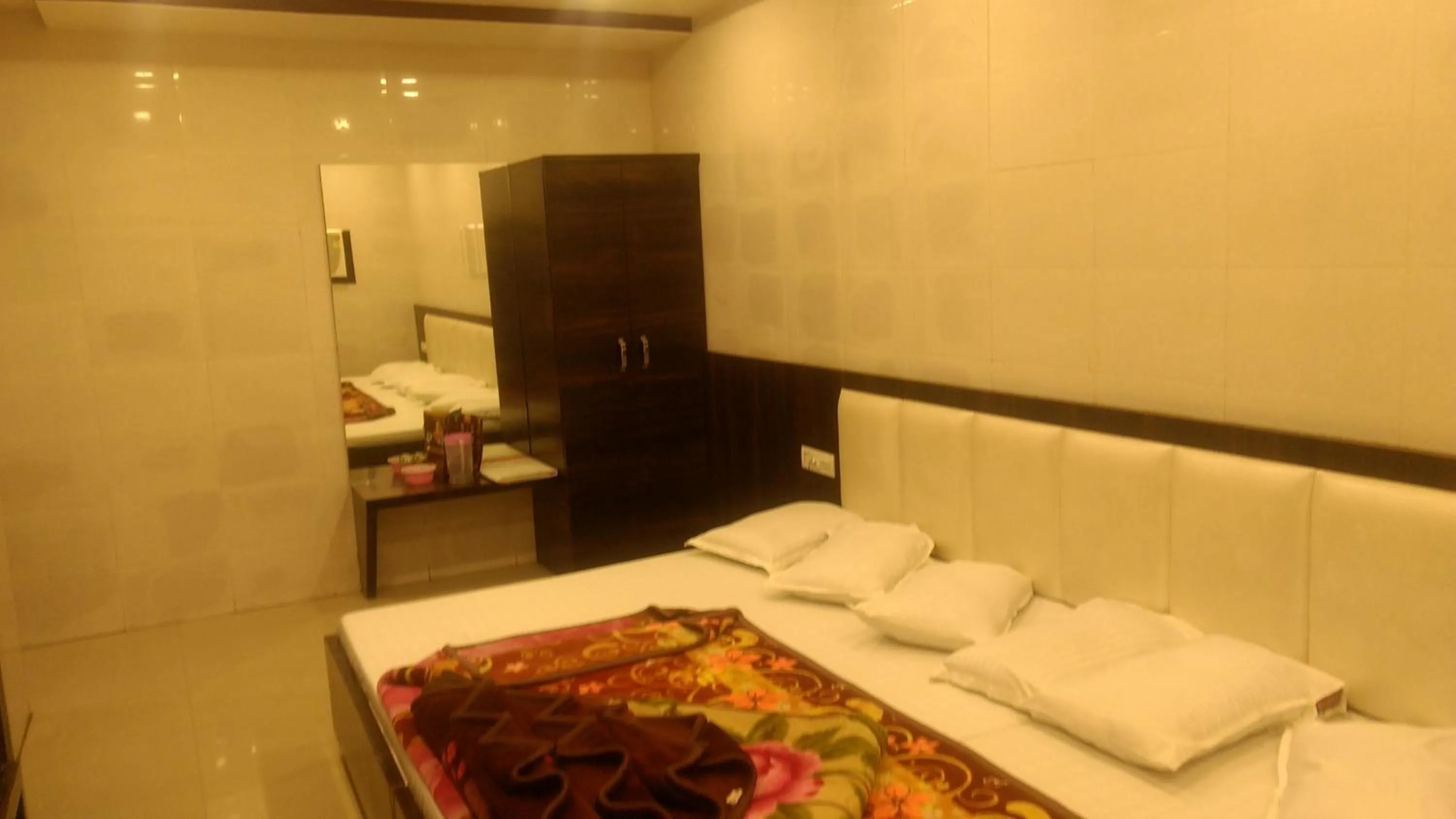 Bed in Ashiyana Inn Hotel