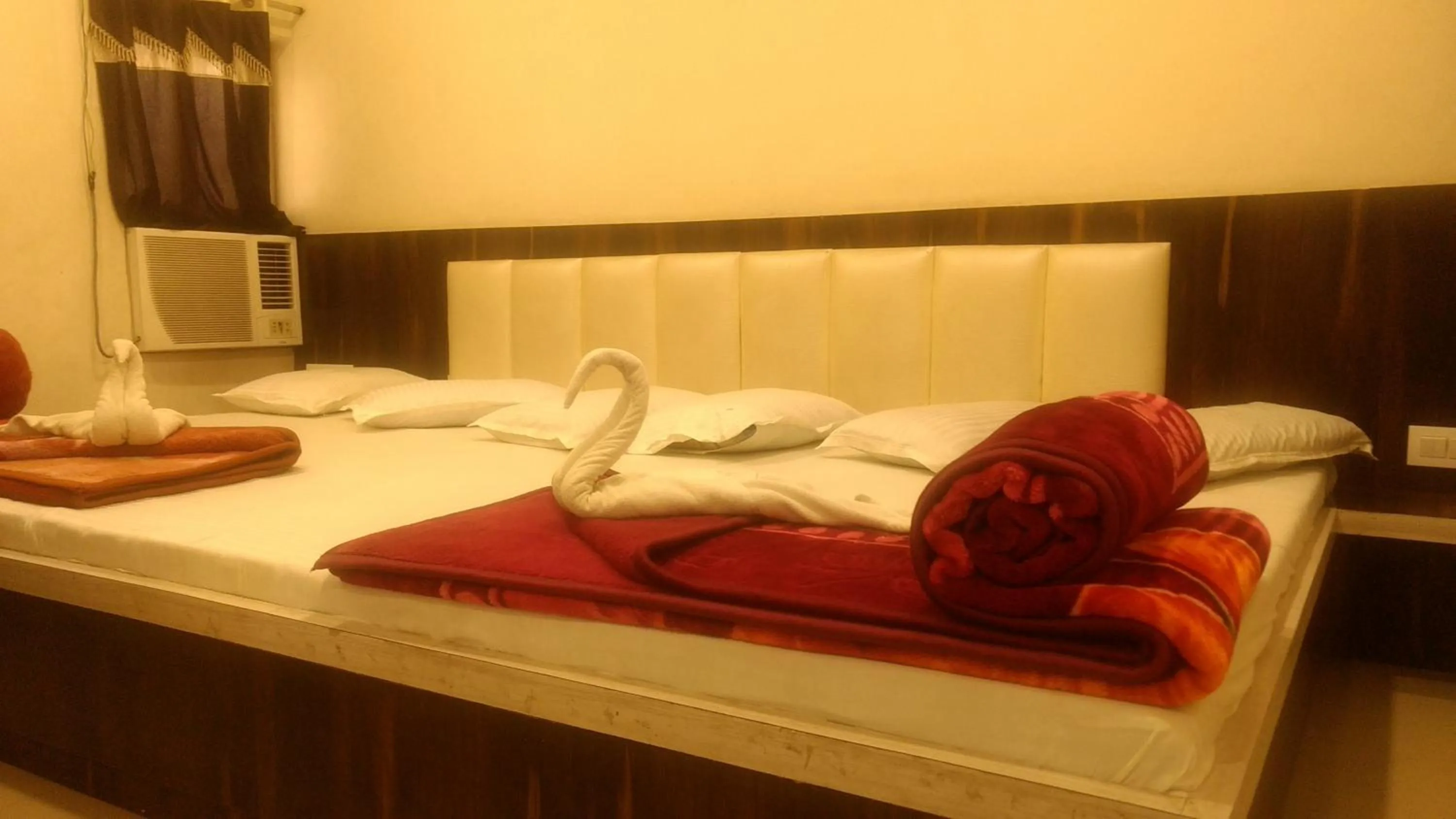 Bed in Ashiyana Inn Hotel