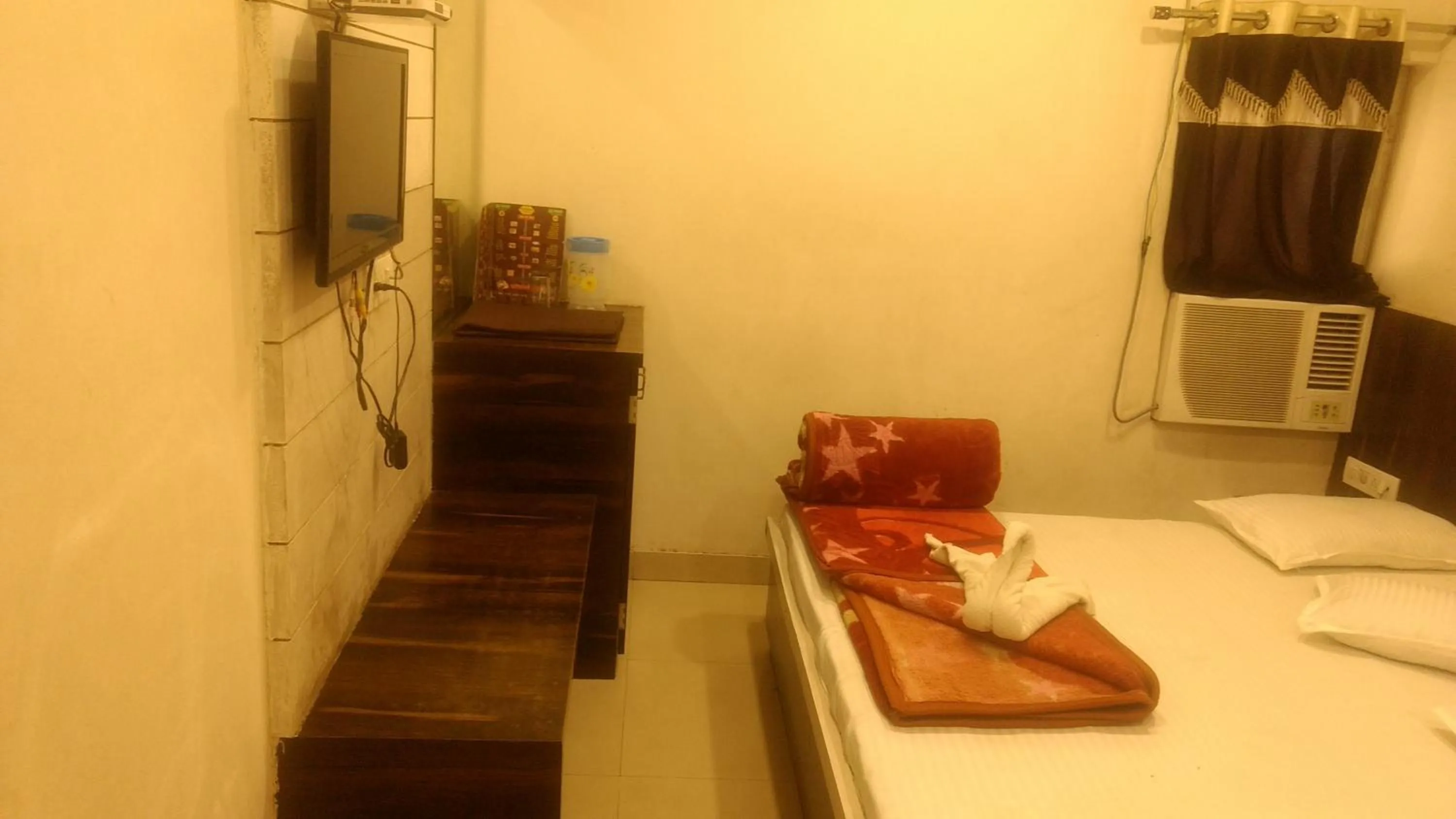 Bed in Ashiyana Inn Hotel