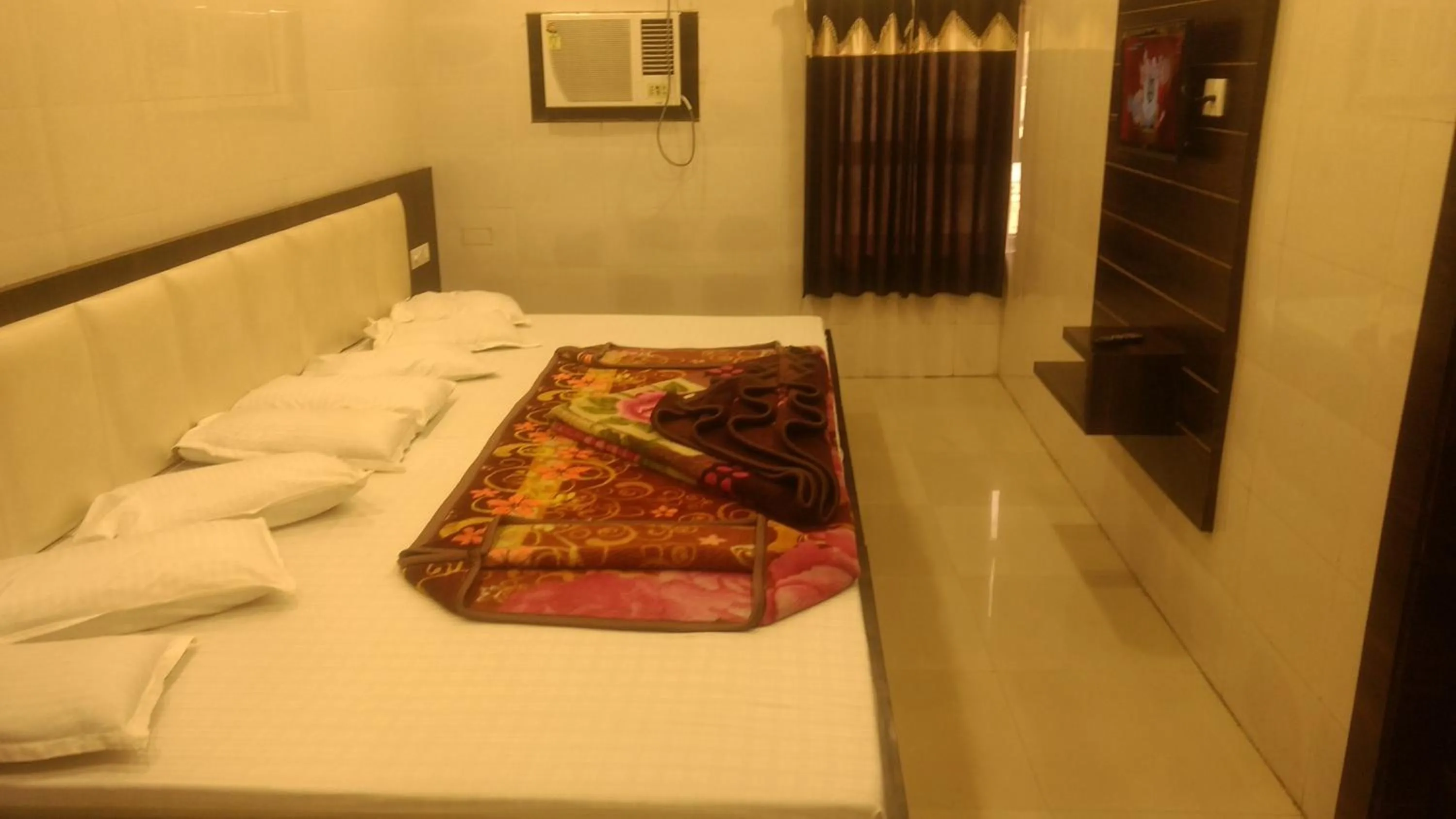 Bed in Ashiyana Inn Hotel