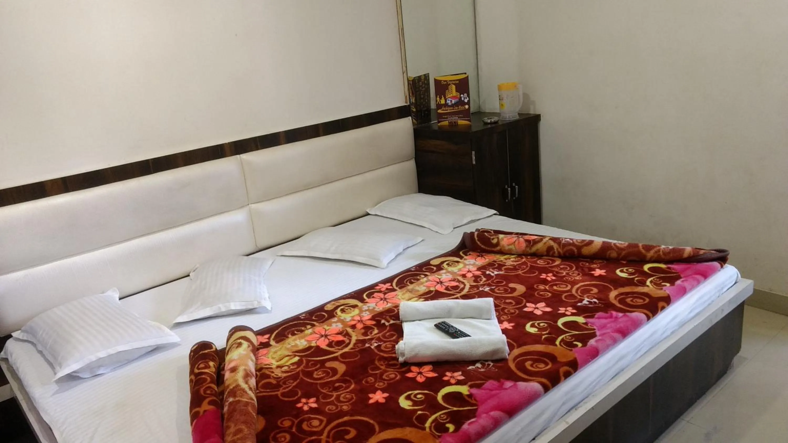 Bed in Ashiyana Inn Hotel