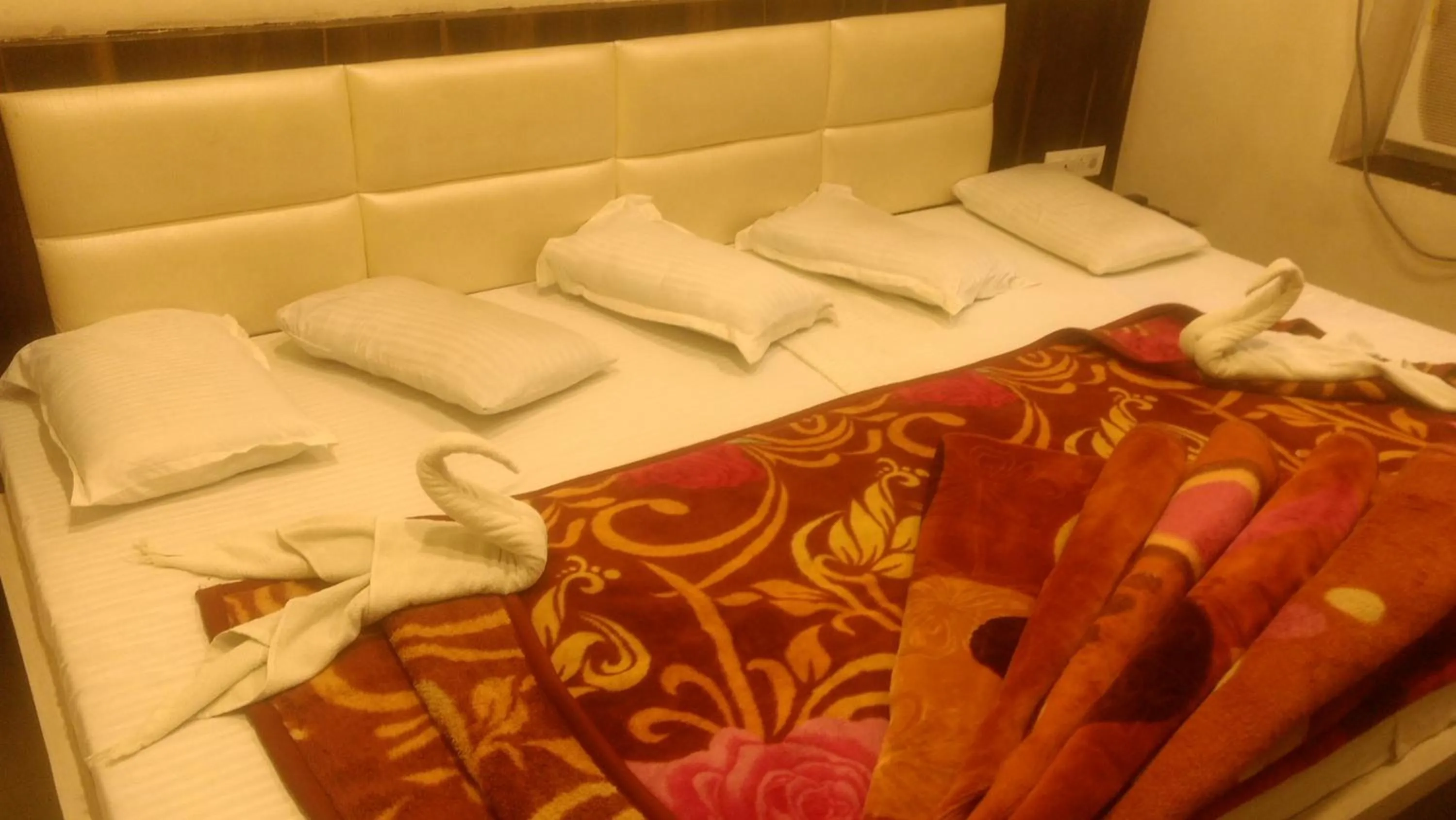 Bed in Ashiyana Inn Hotel