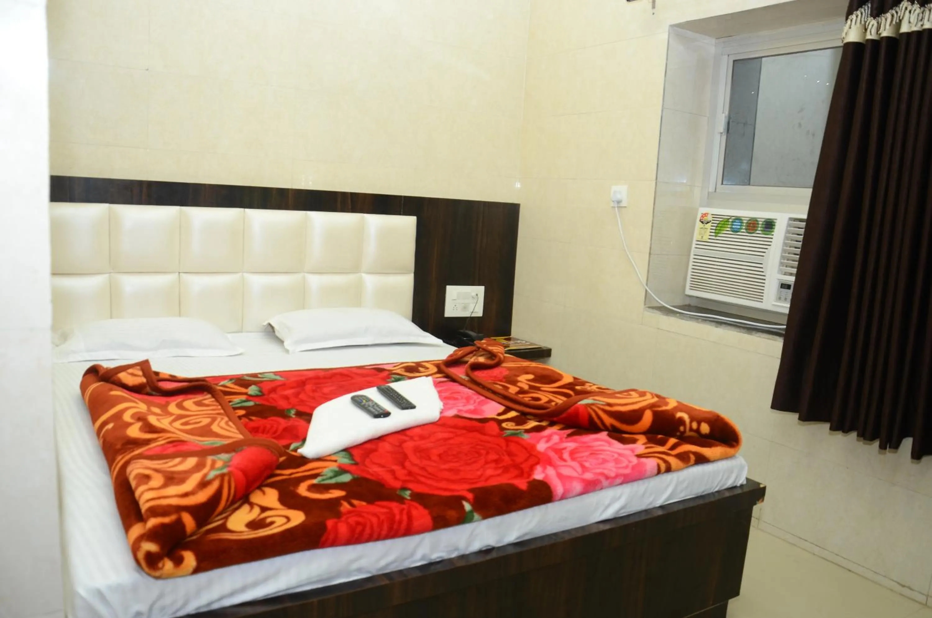 Bed in Ashiyana Inn Hotel