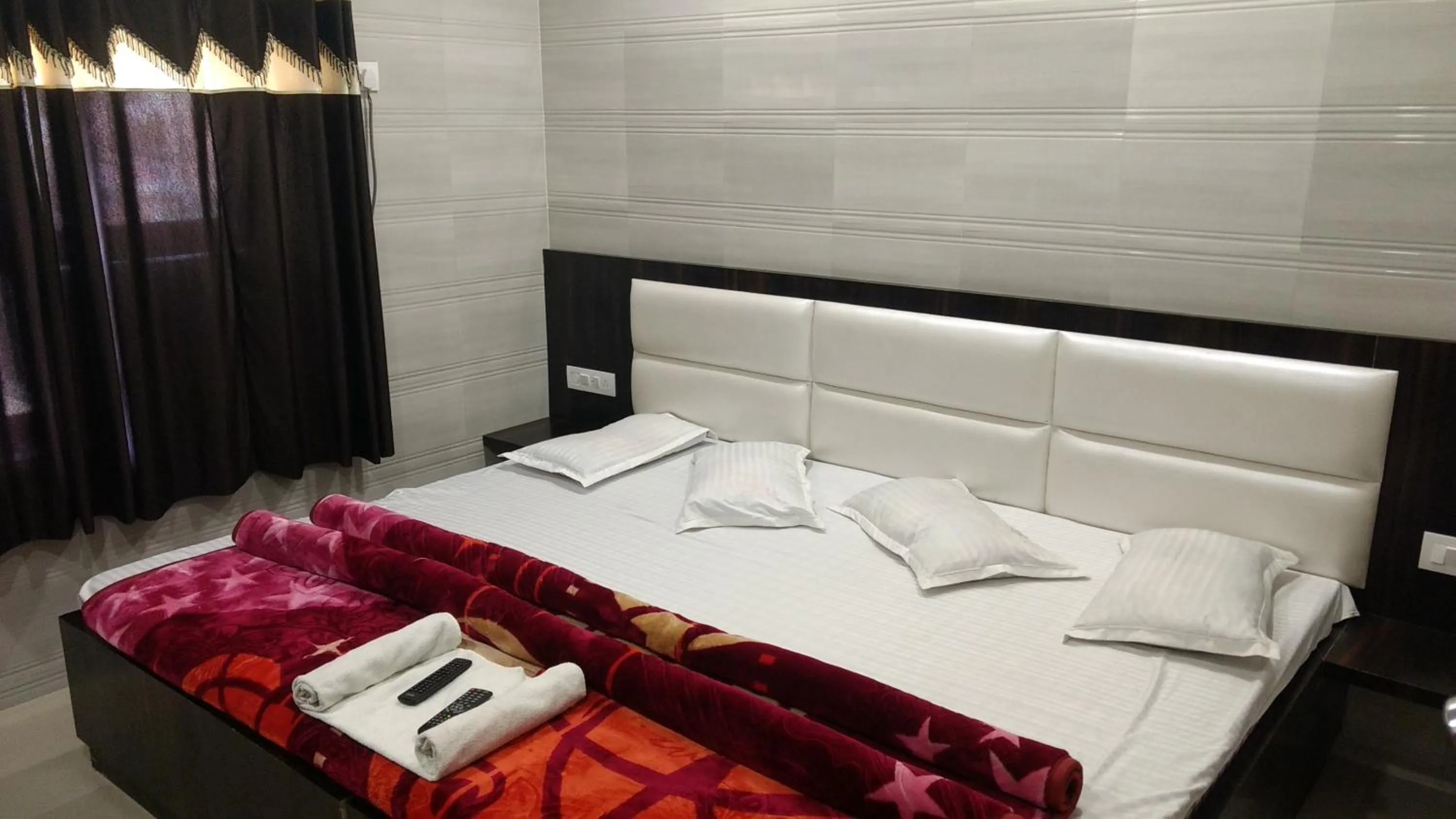 Bed in Ashiyana Inn Hotel