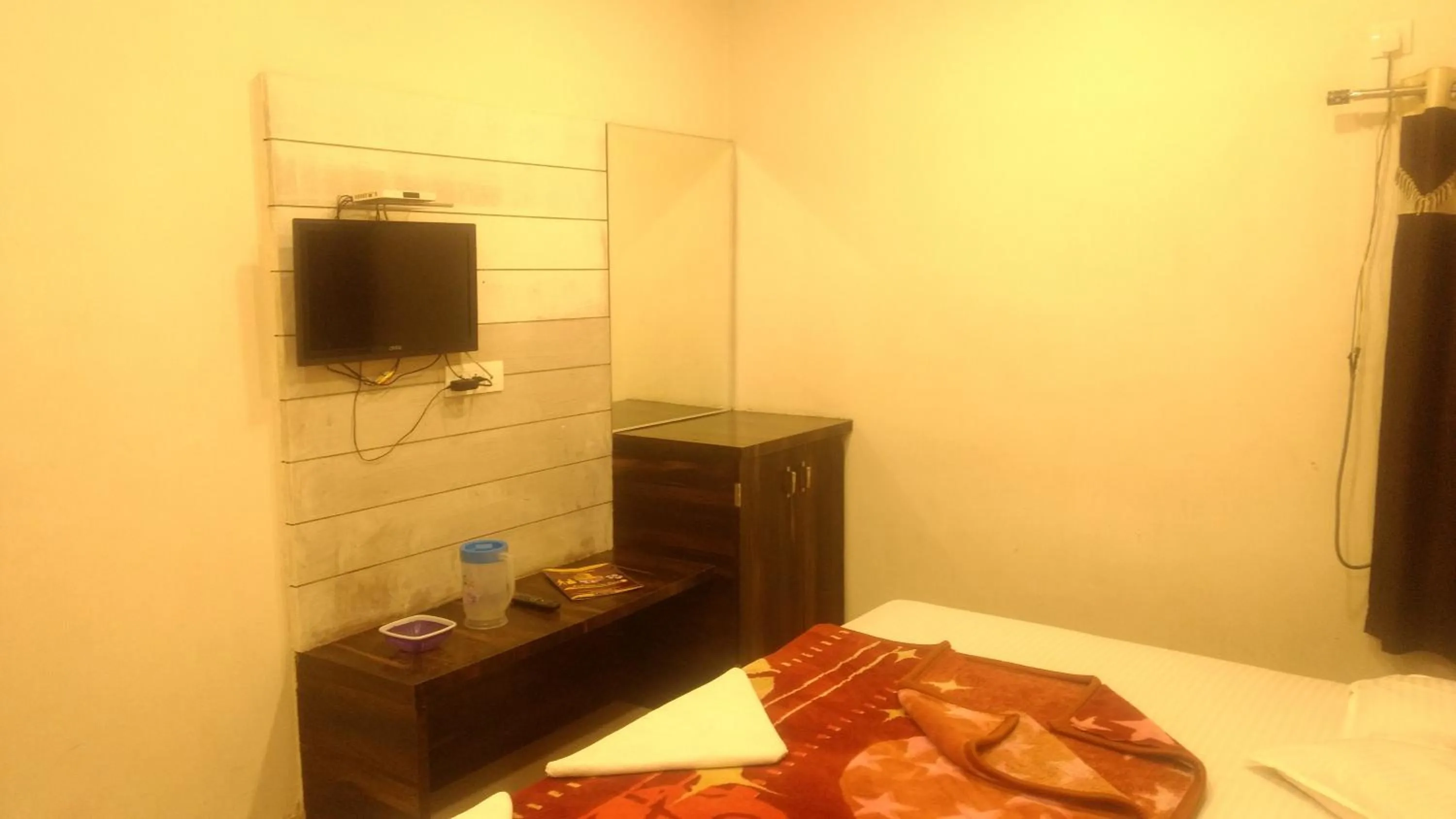 Bed in Ashiyana Inn Hotel